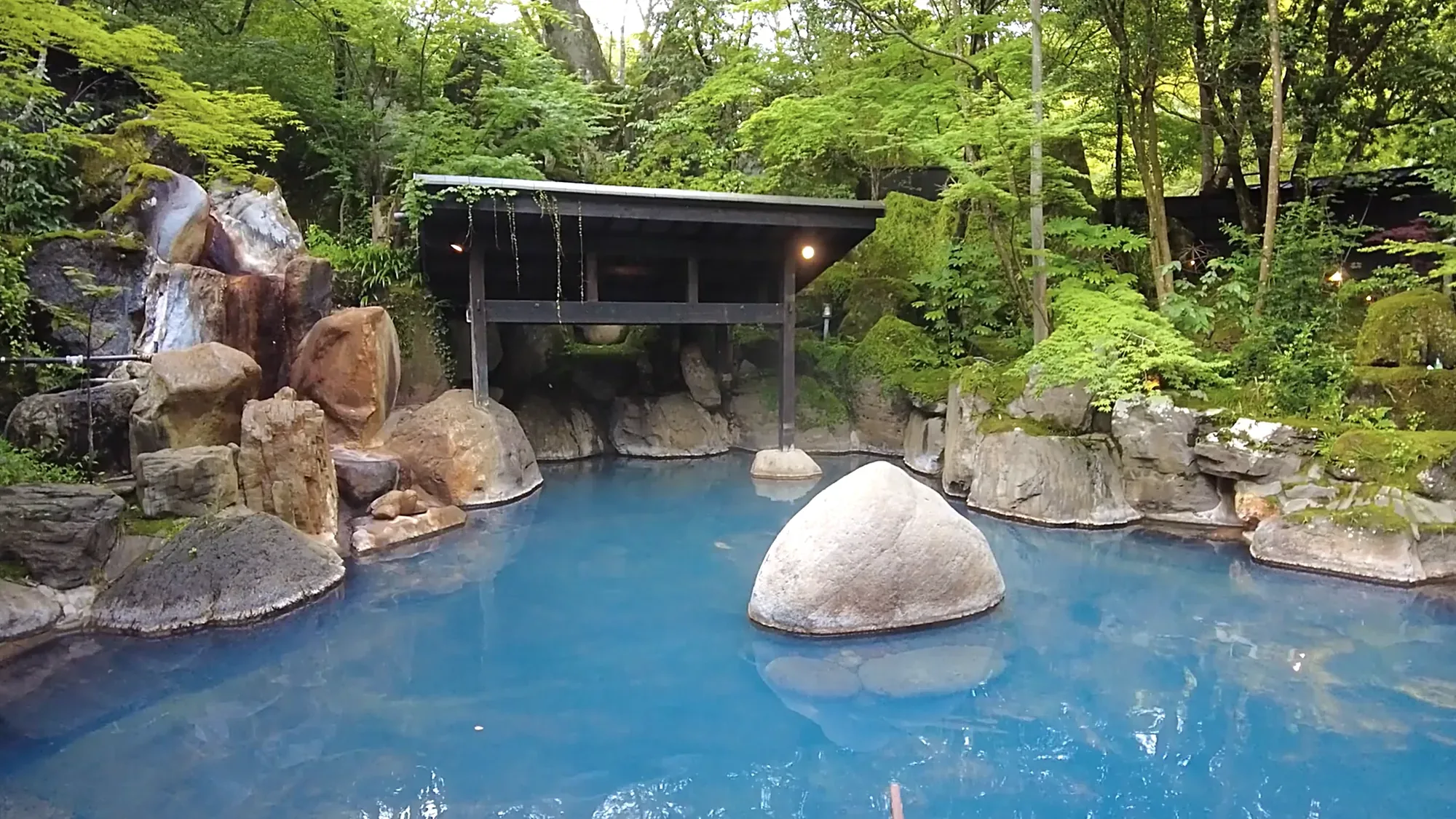 Inns above the river at Kurokawa Onsen in full autumn colour