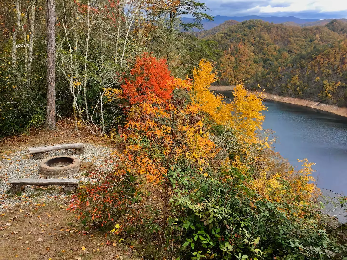 Fire pit circle in fall color above Fontana Lake