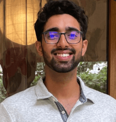 man in gray pullover hoodie closed eyes while heads up