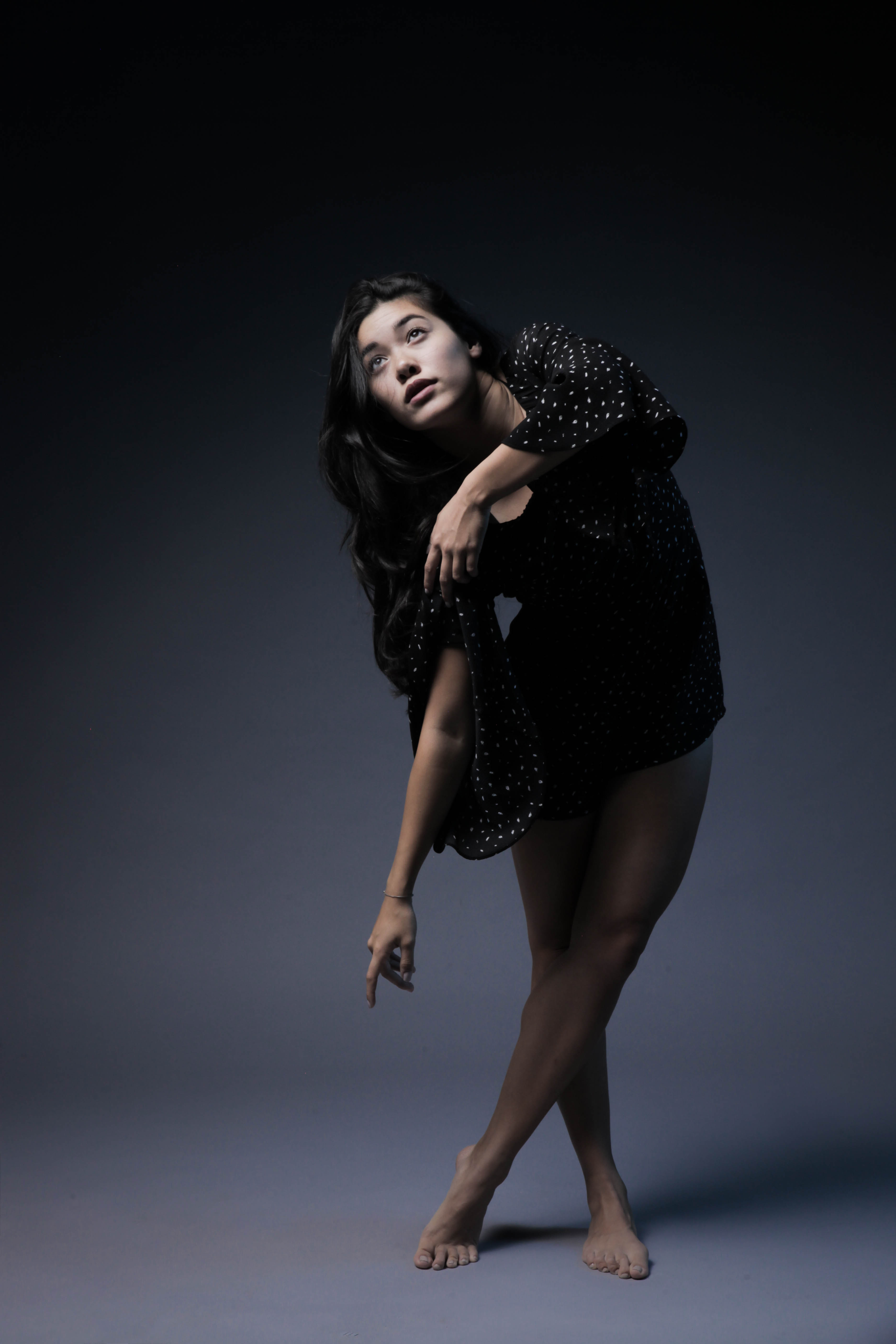 Man standing on a stone, in the background is sunshine