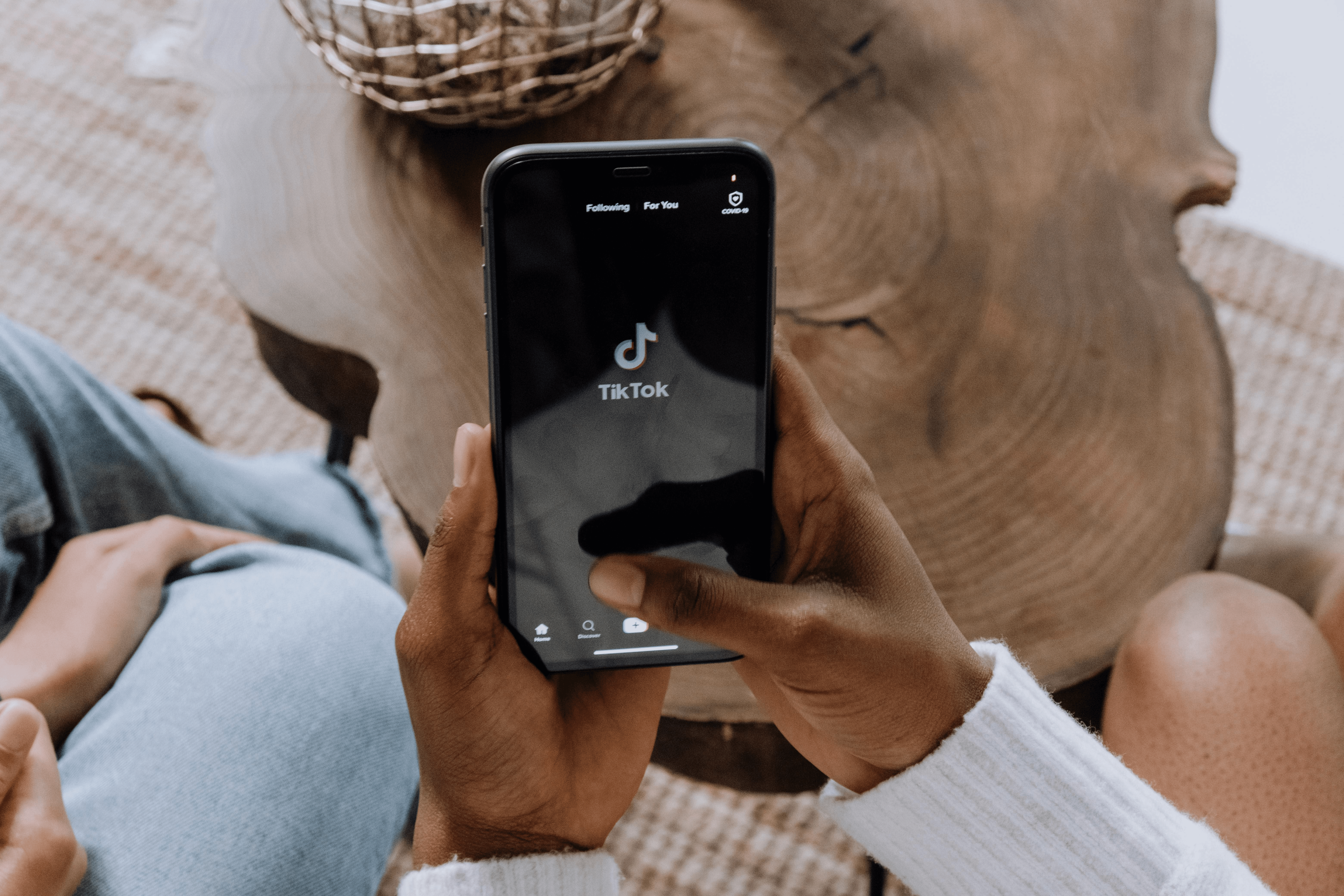 Man using TikTok app on phone - : POV Ideas for TikTok