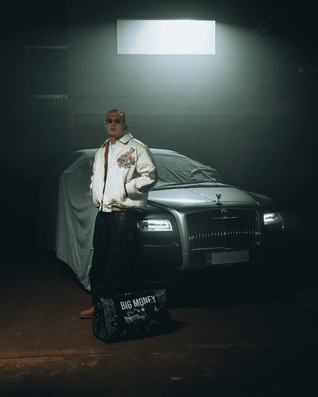 pair of white-and-orange athletic shoes on white box