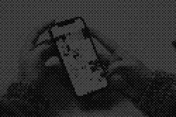 person holding white iphone 5 c