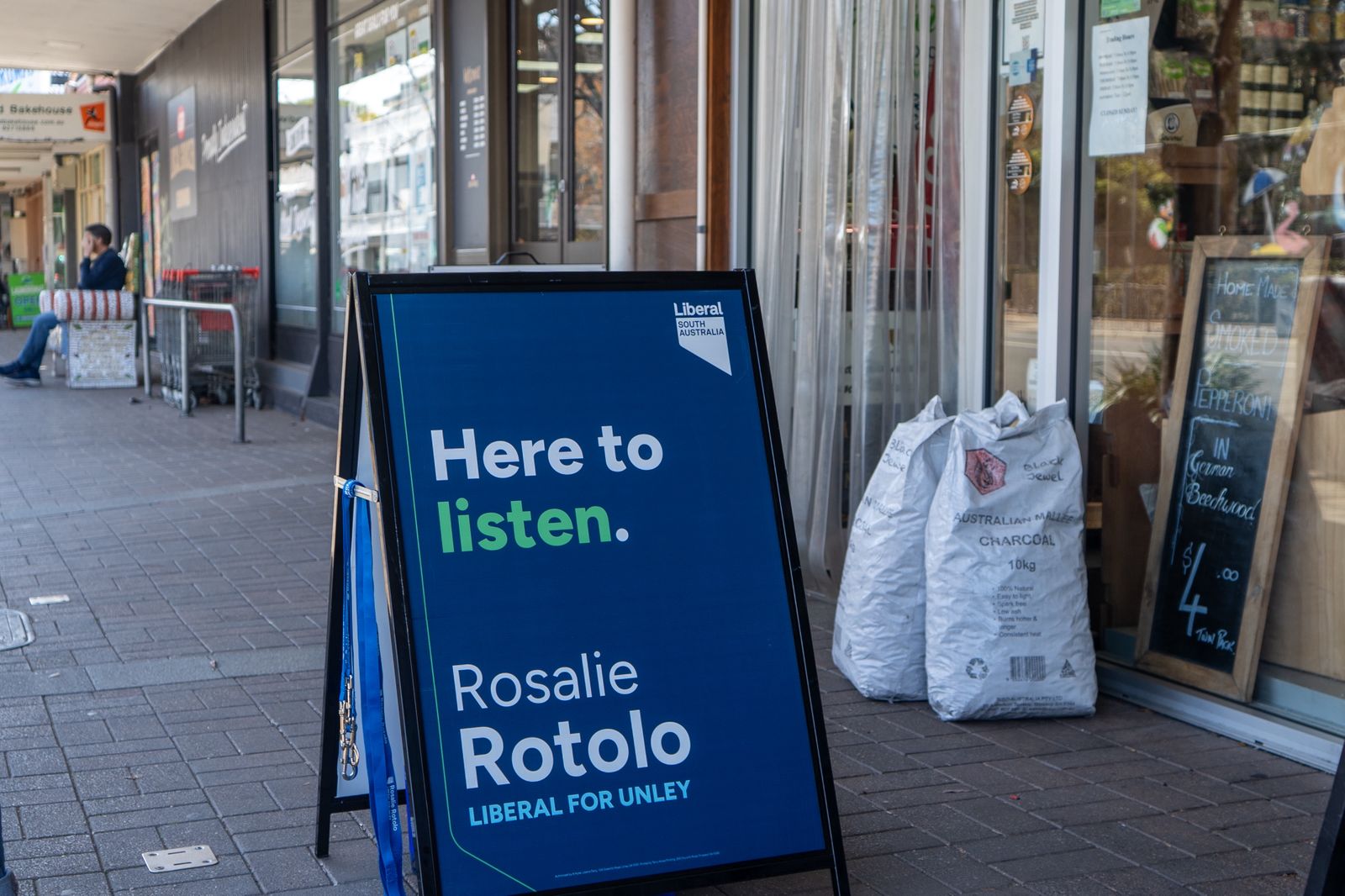 person standing near table