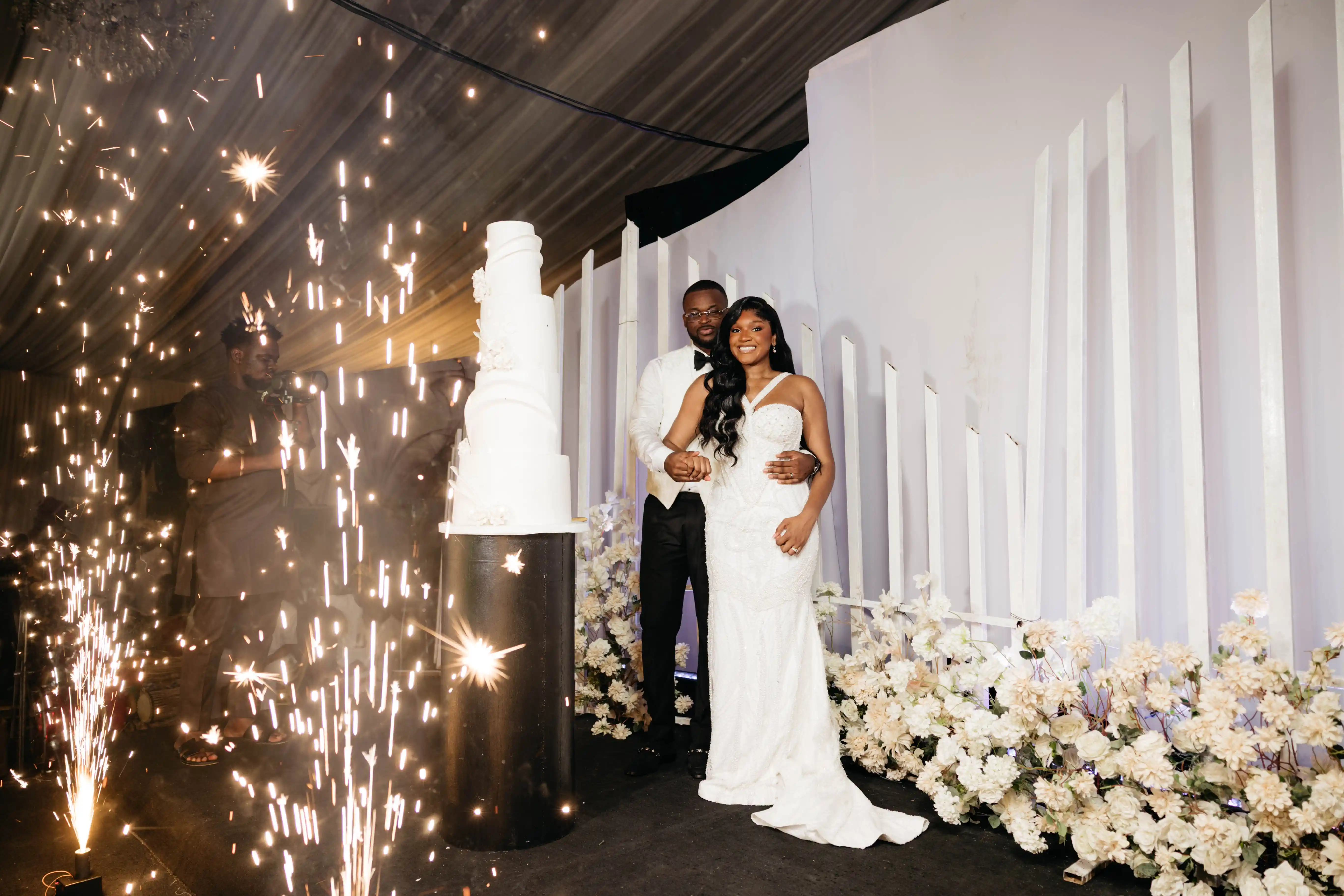 Bride and groom celebrating a luxury wedding coordinated by Victoria Brooks Events, a premium wedding planner in Nigeria.