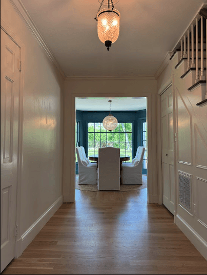 View of dining room from the hallway, showing 2 pendant lights