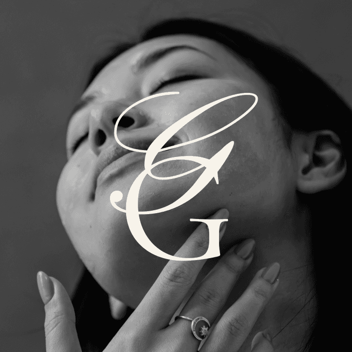 A woman relaxing in soft sunlight, surrounded by plants and warm decor, emphasizing the peaceful and rejuvenating experience of the spa.