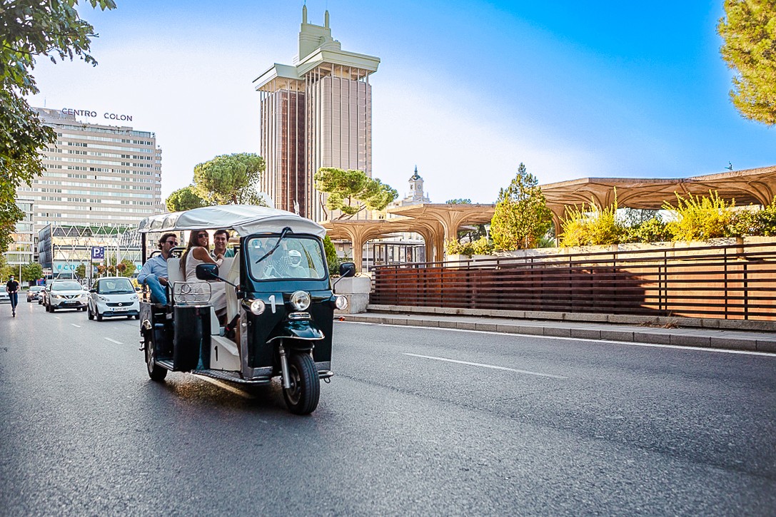 Lisbon Eco Tuk Tuk tour passing by the iconic Belém Tower.