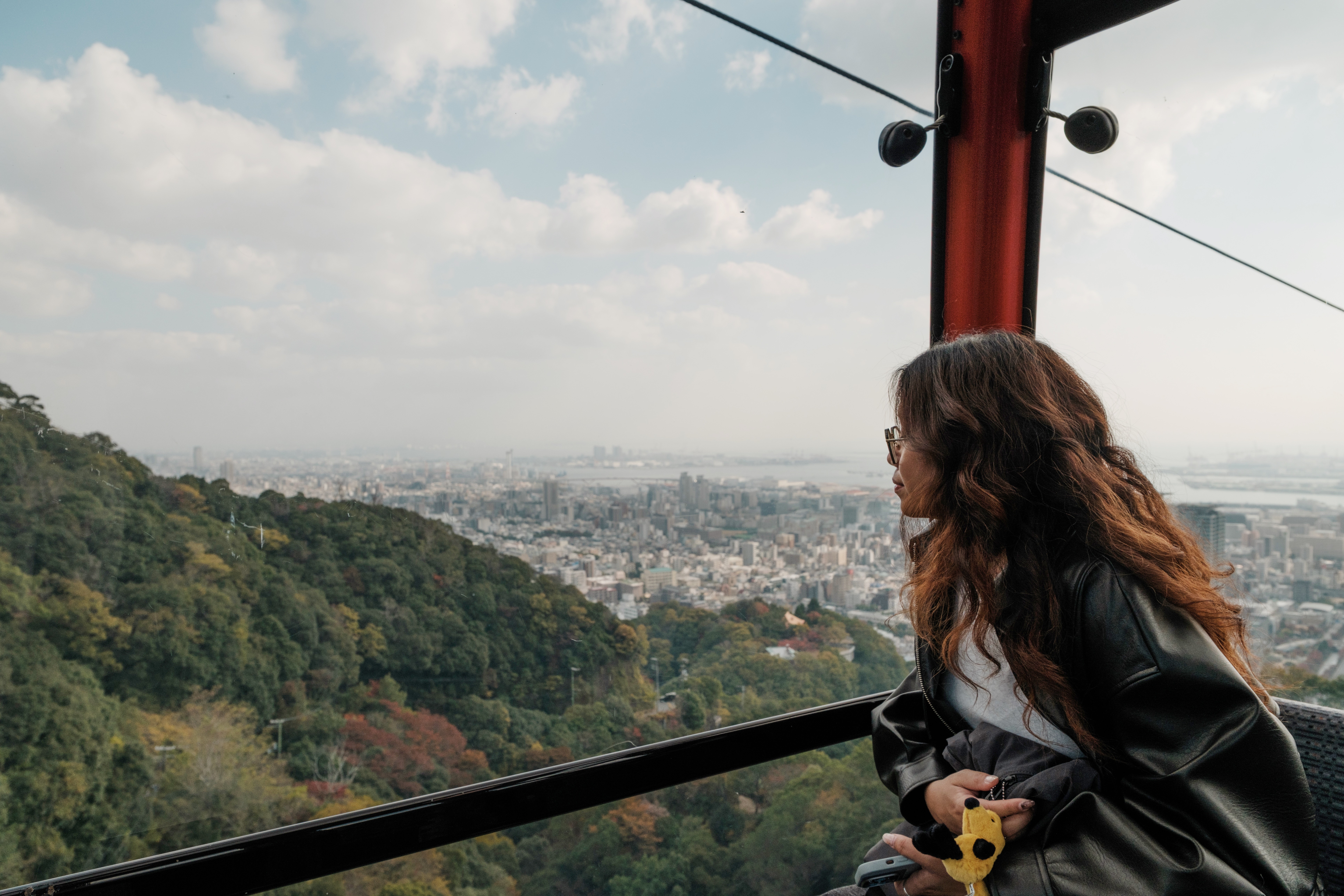 Side shot of a aman wearing a cap with the sun setting in the background