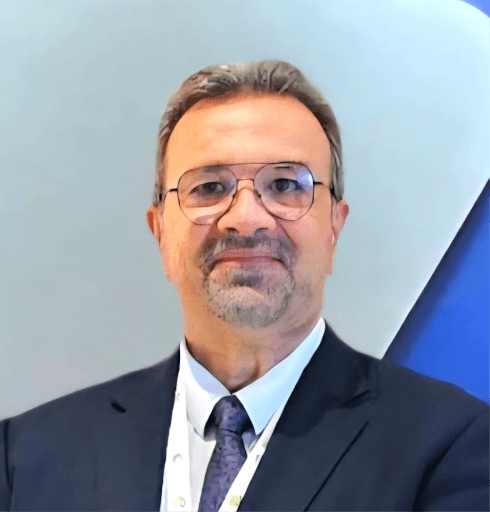 image of man wearing glasses folding his arms