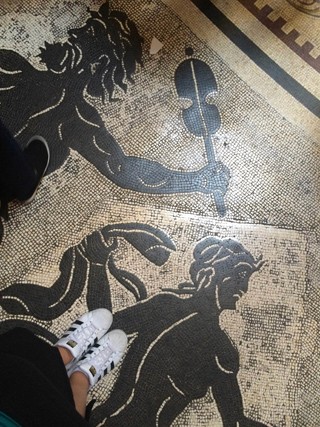stepping on a figurative floor mosaic