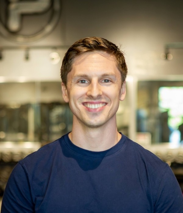 black and gray dumbbells on brown wooden crate
