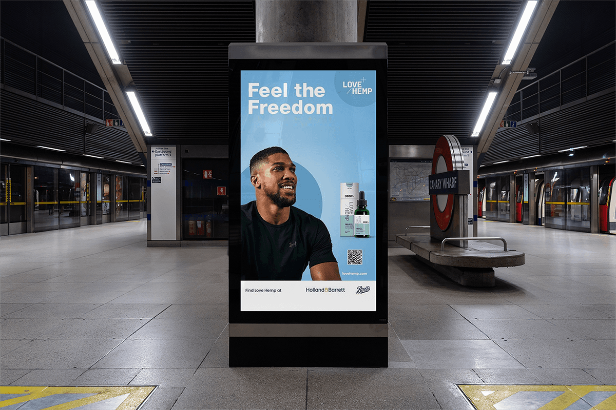 Streetside billboard with flyposters of the Batch.Works brand and illustrations