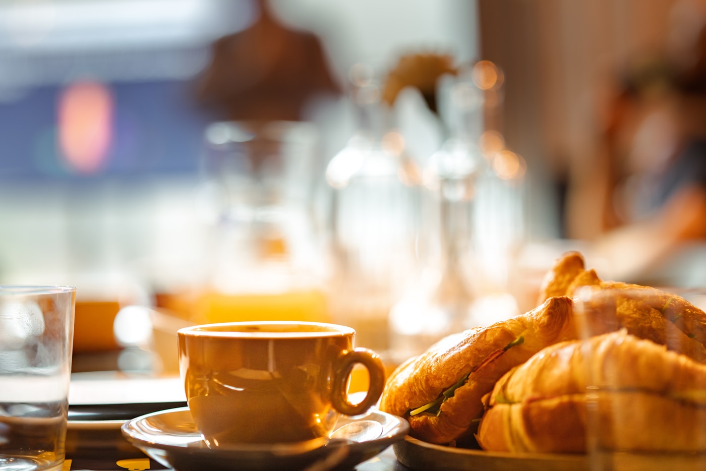 Friends sharing coffee and baked treats