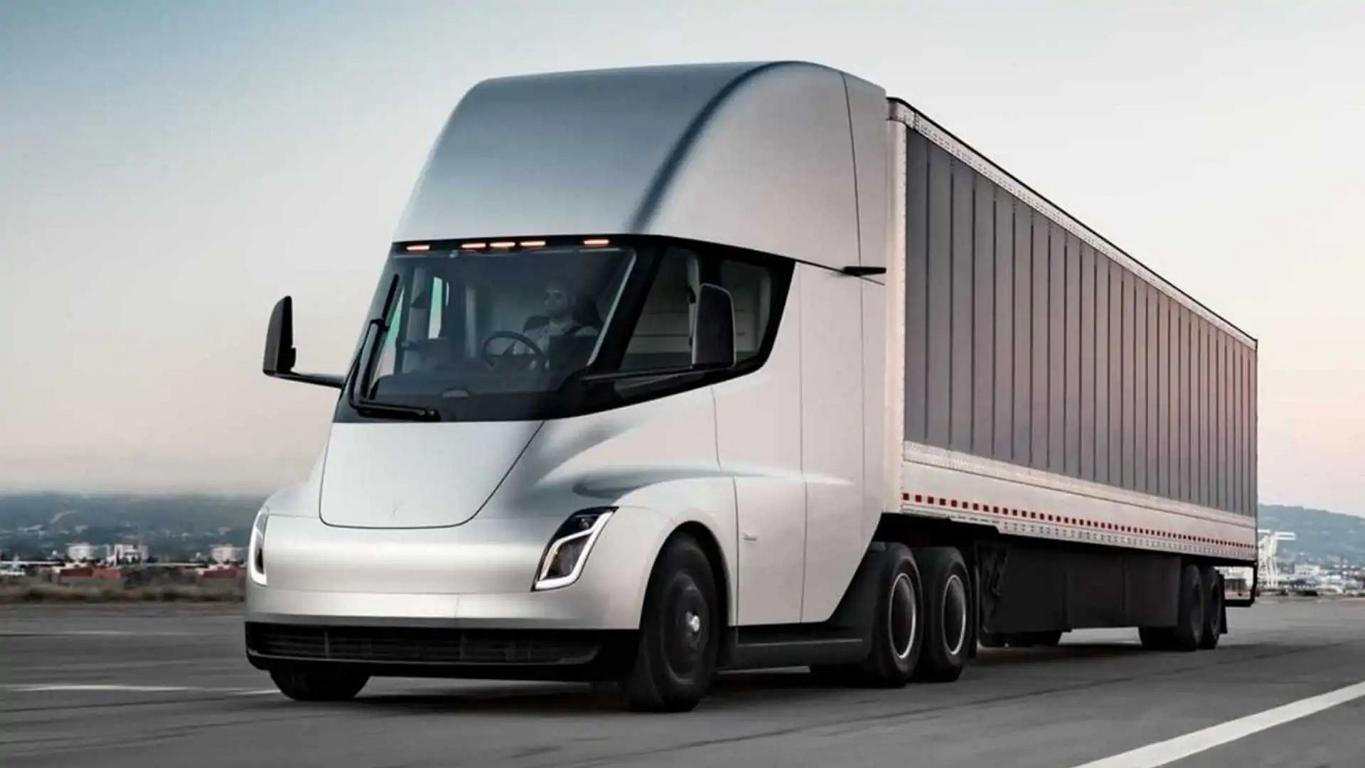 Fleet of heavy goods vehicles on a highway with a focus on carbon pricing and emissions reduction. 