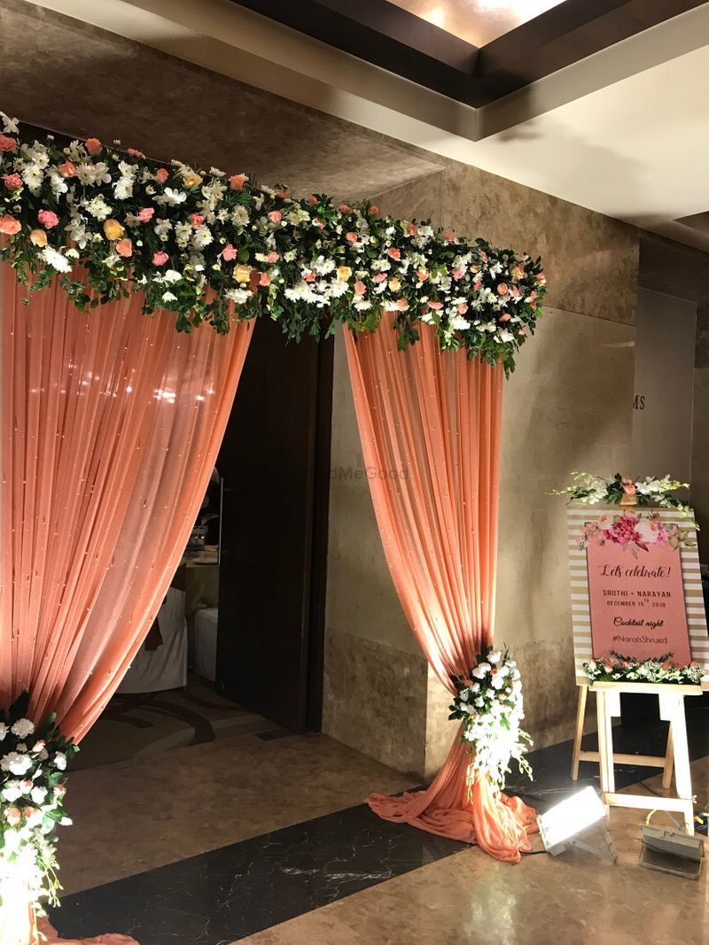 Wedding entrance gate decoration with peach drapes & flowers at banquet hall in Indirapuram, Vaishali, Raj Nagar, Vasundhara