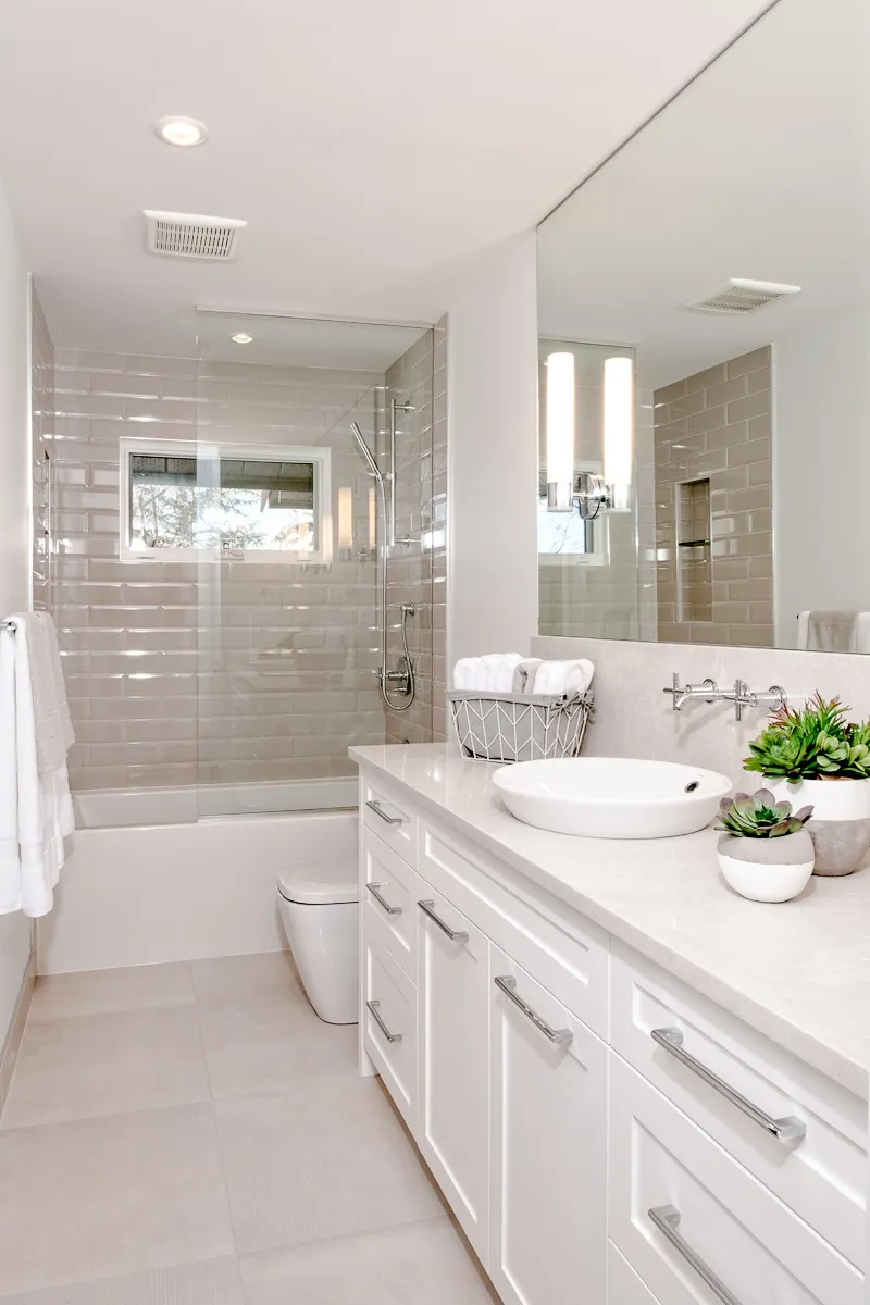 Image of Luxurious primary ensuite bathroom design by KHD Homes featuring modern layout design and spa-like atmosphere.