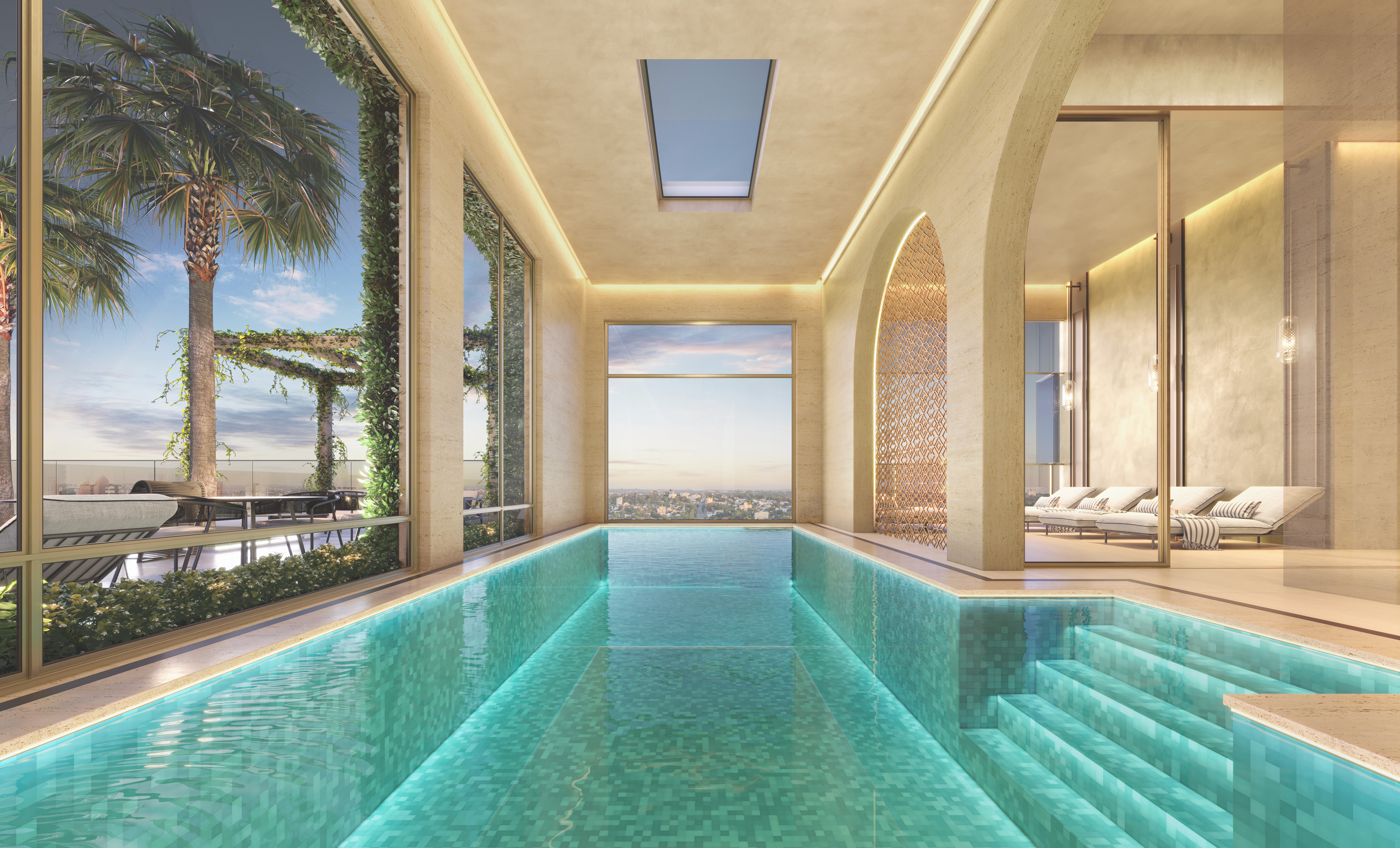 Curved modern skyscraper against a clear blue sky.