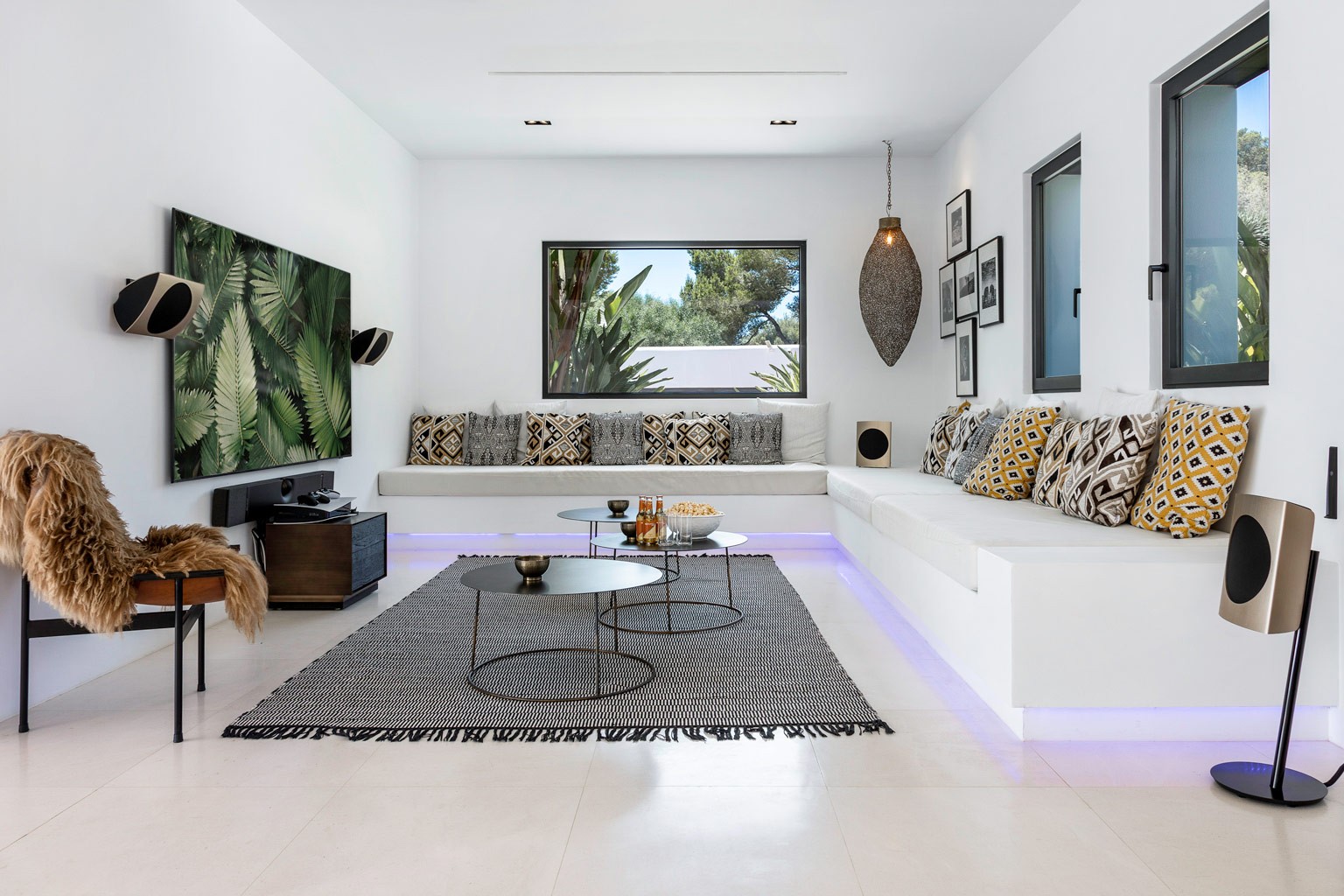 TV corner lounge area in an exclusive luxury villa Ibiza salon—private amenities, VIP estate property holiday retreat