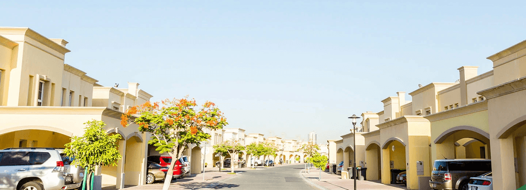 A large house labeled "Springs 15" with a car parked in the driveway.
