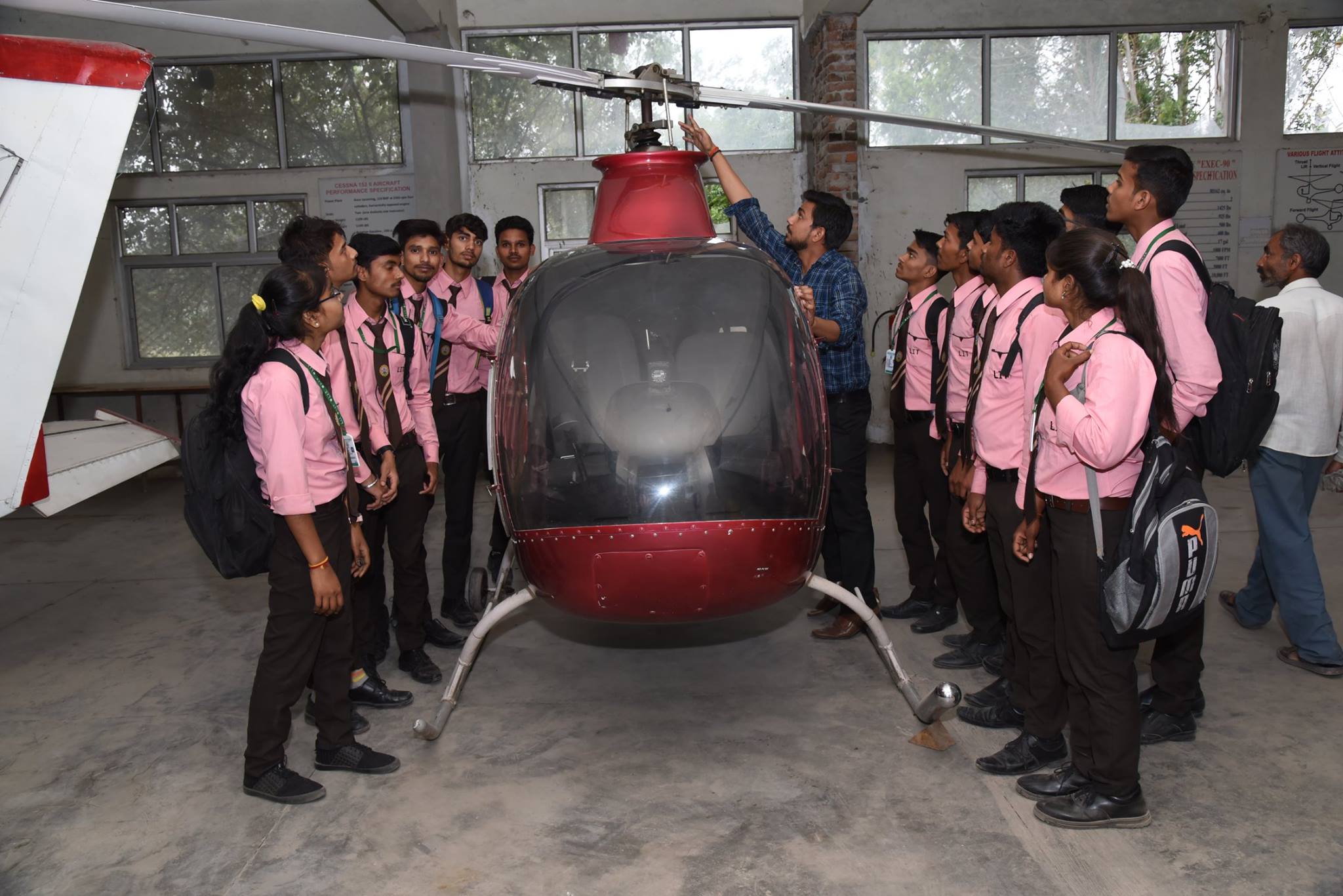 Full moon rising behind a house at night