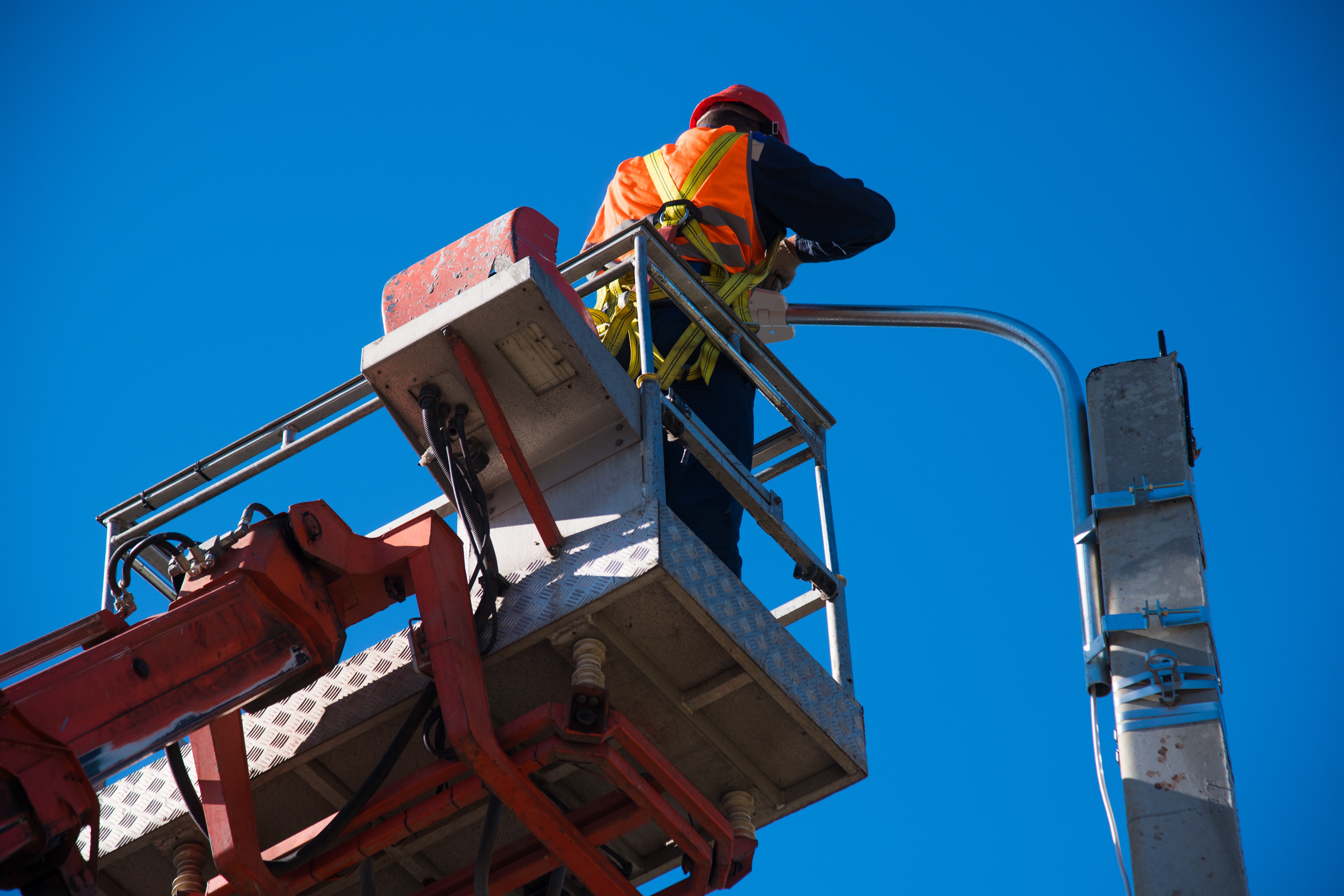 worker maintencing a camera