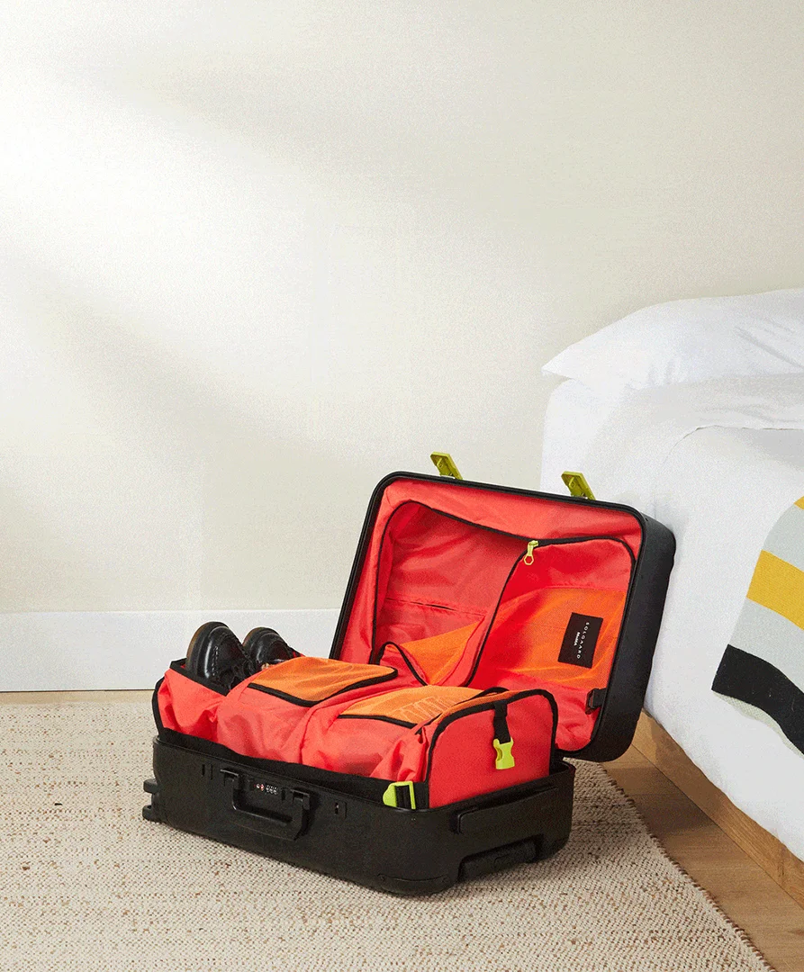 MoMA × Solgaard luggage shown in real-world use with integrated closet system