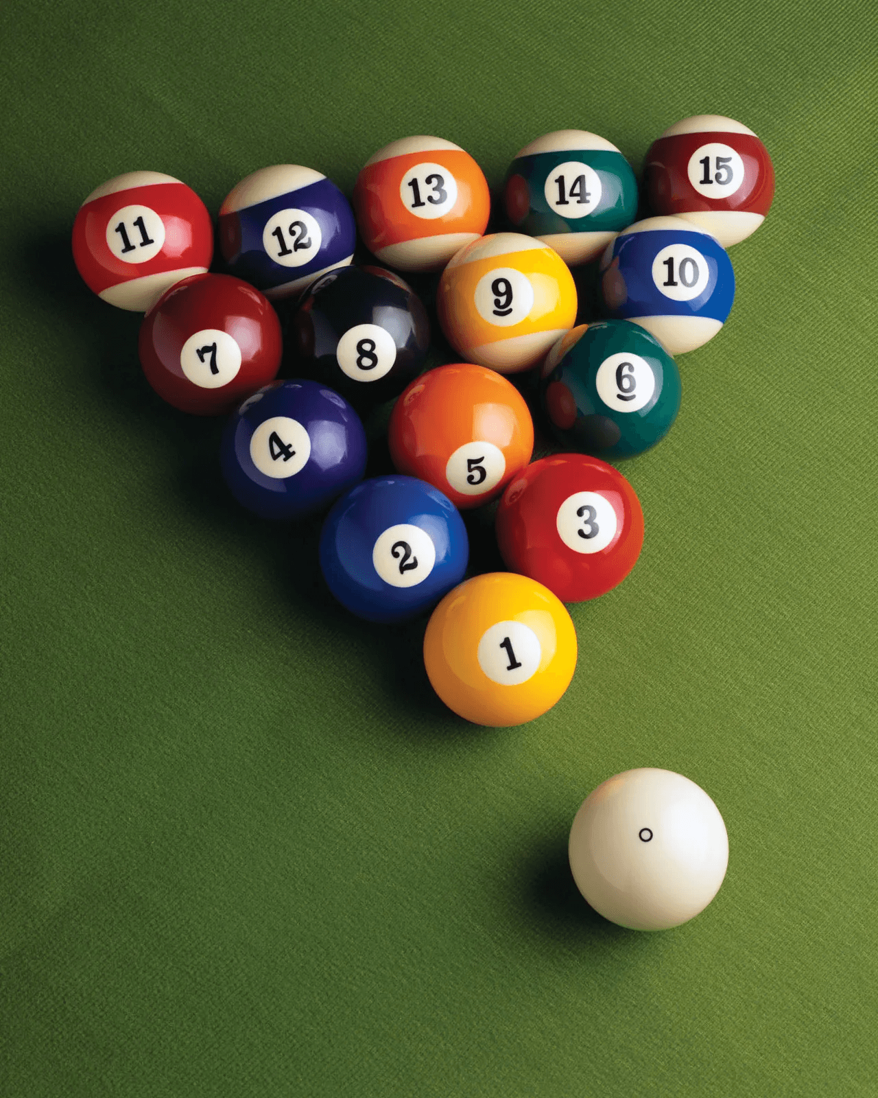 A pool table with a triangle rack of colorful balls and a white cue ball in front, set on a green felt surface.
