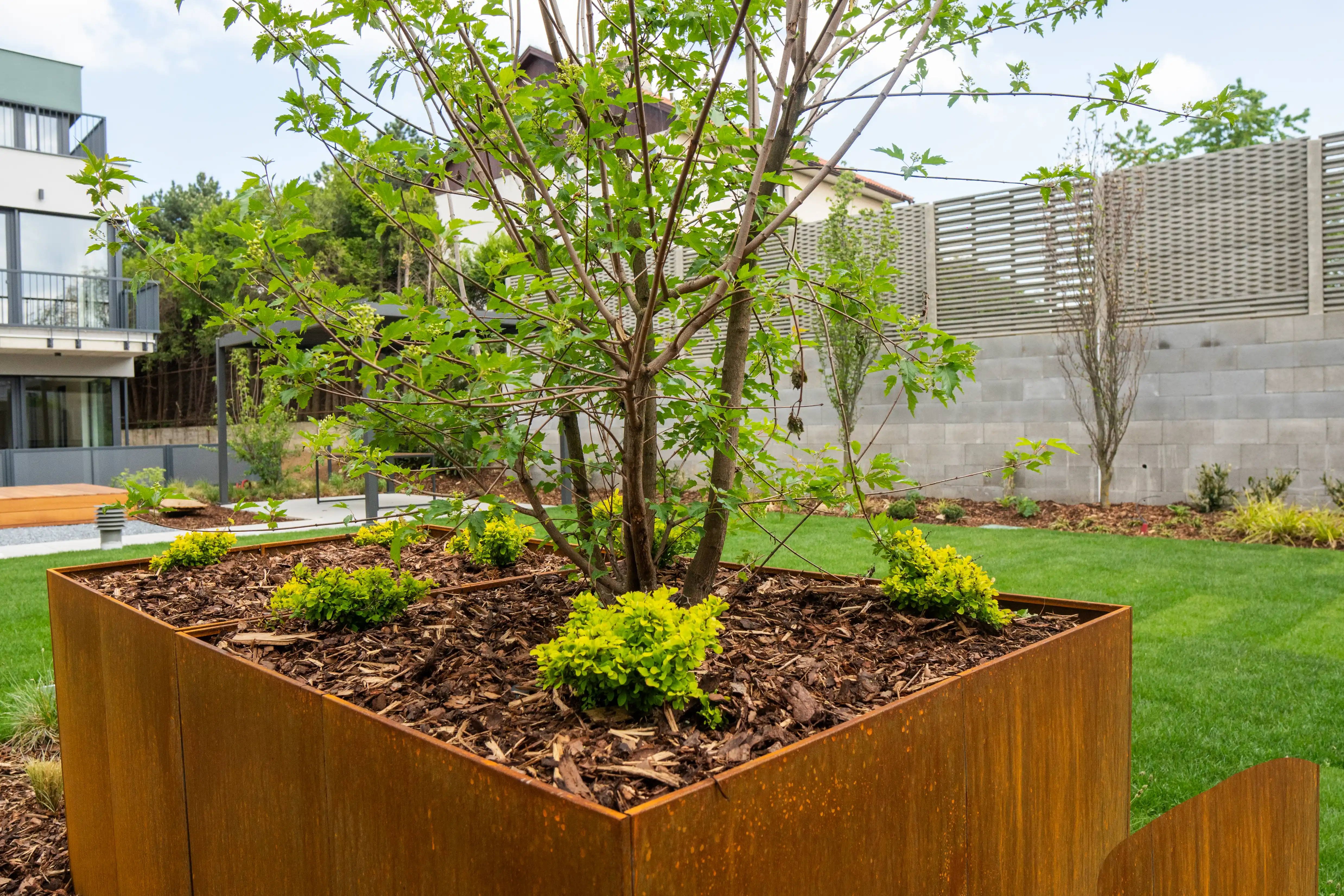 Beautiful landscaped garden with greenery and outdoor design elements.