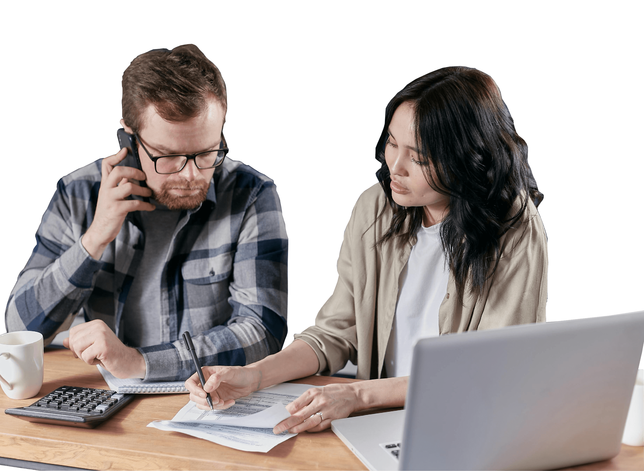 Business couple reviewing paperwork and discussing licensing with Barnab.