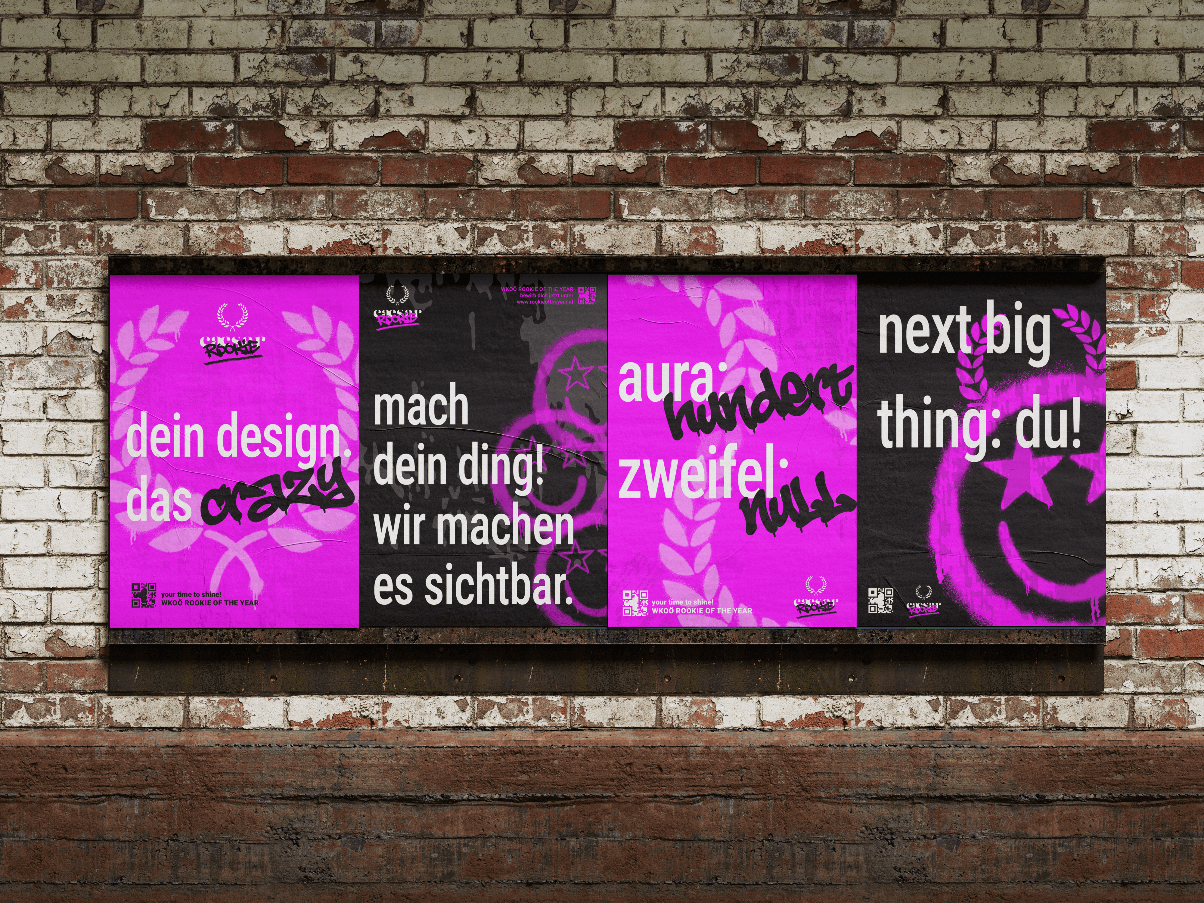 Three brightly colored posters with bold text on a textured wall, featuring pink and black designs.