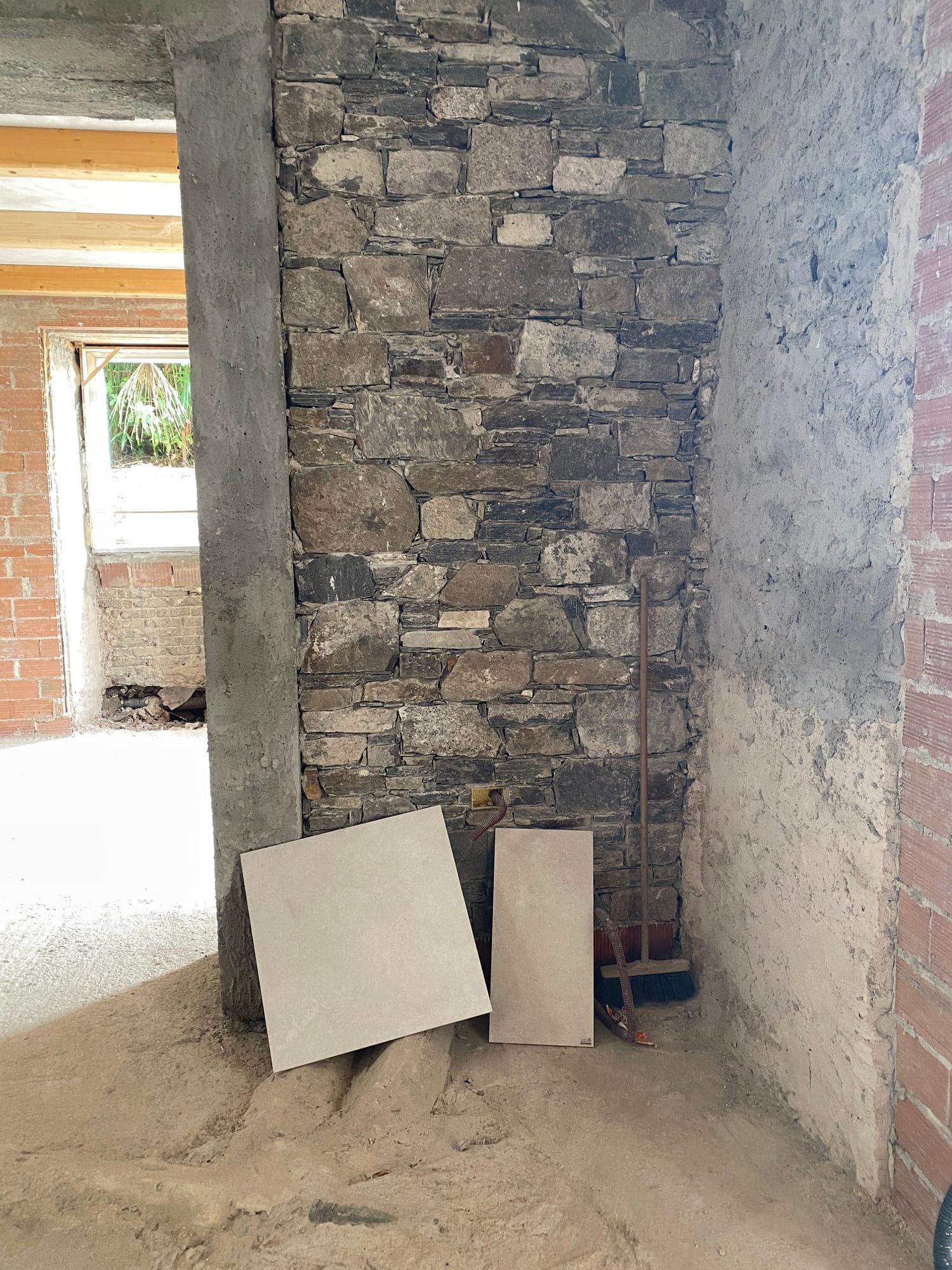 Stone wall inside the house during the works