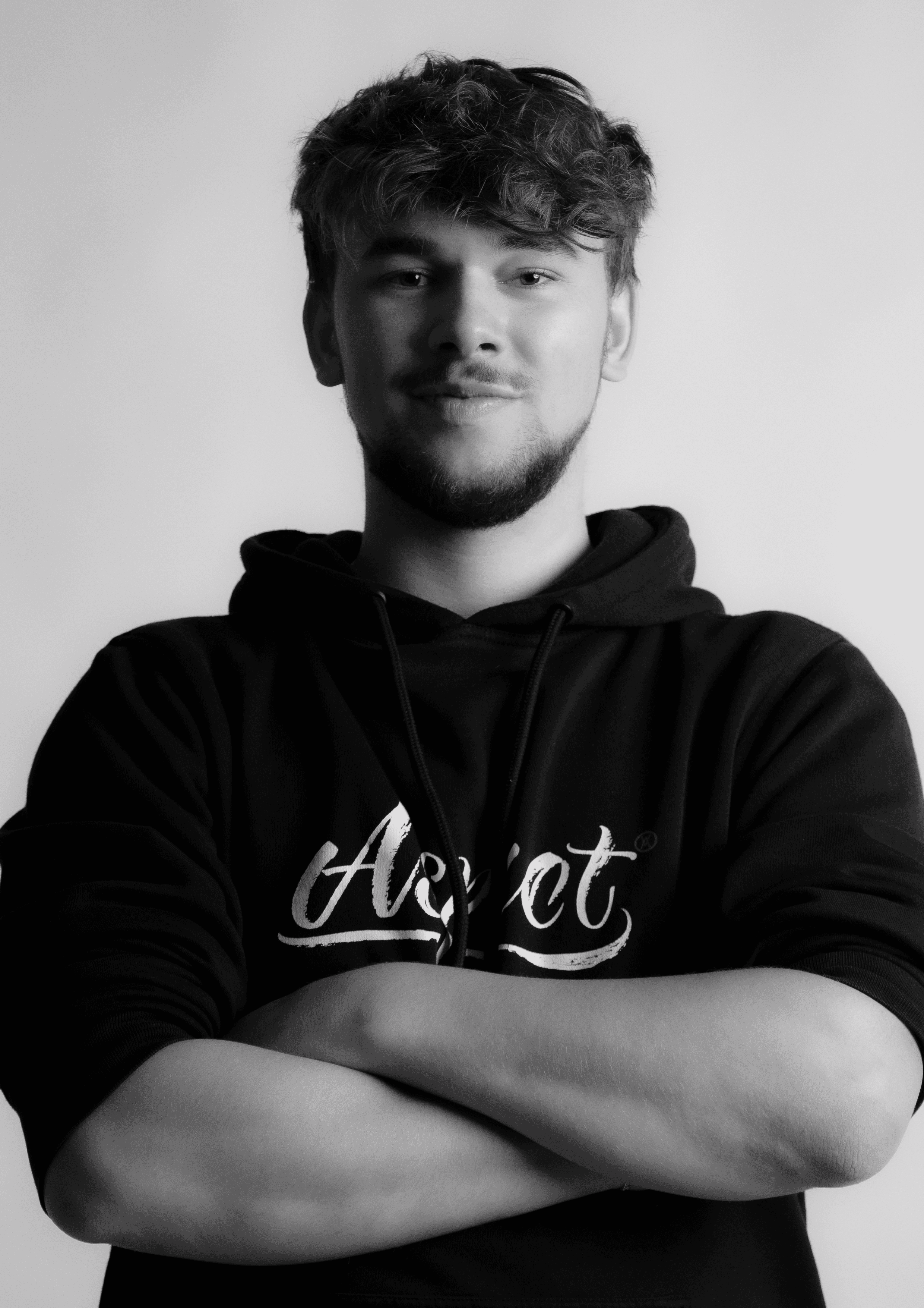 a blurry photo of a person standing in front of a wall