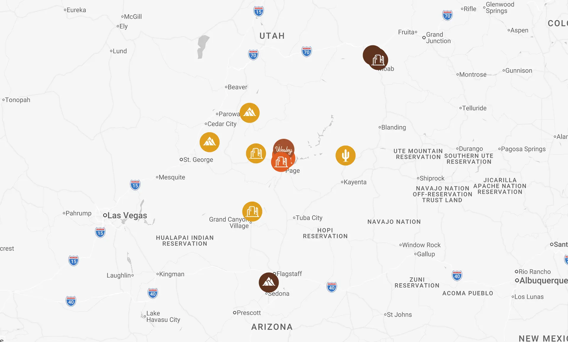 Map showing clusters of red markers on a blank white background, indicating specific points of interest or locations.