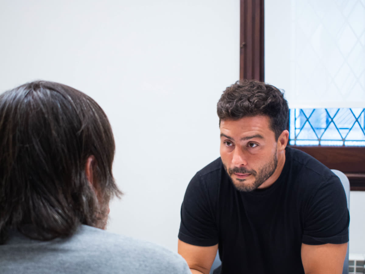 Abogado de PSV explicando el cálculo del haber jubilatorio a un consultante