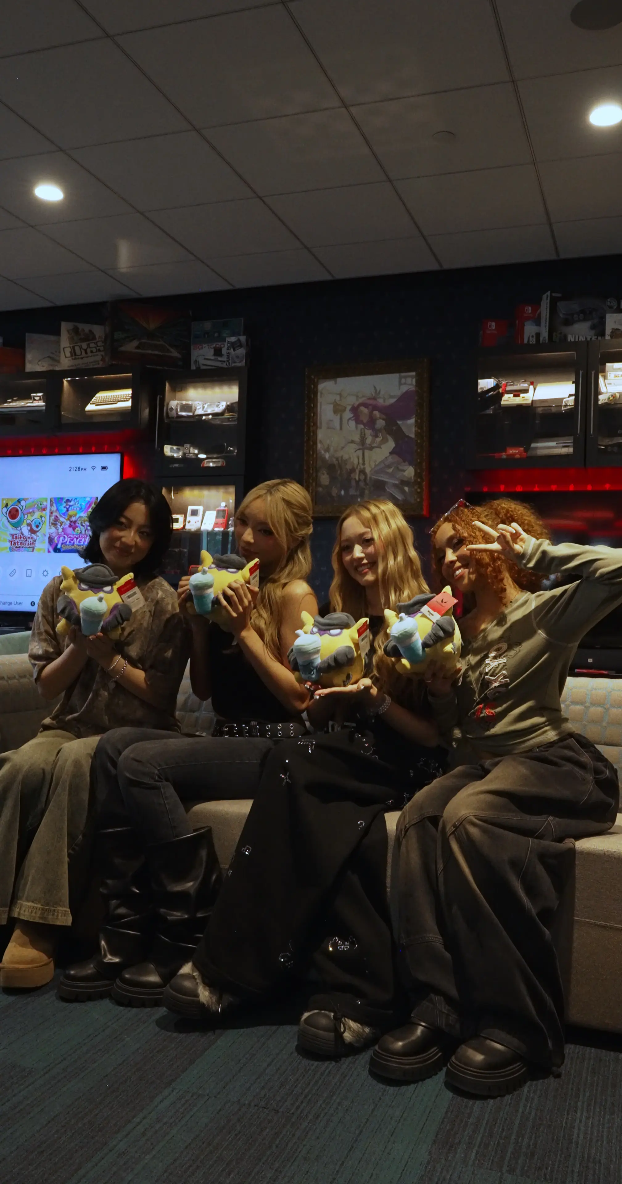 GIRLSET holding plushies of Wingman from VALORANT