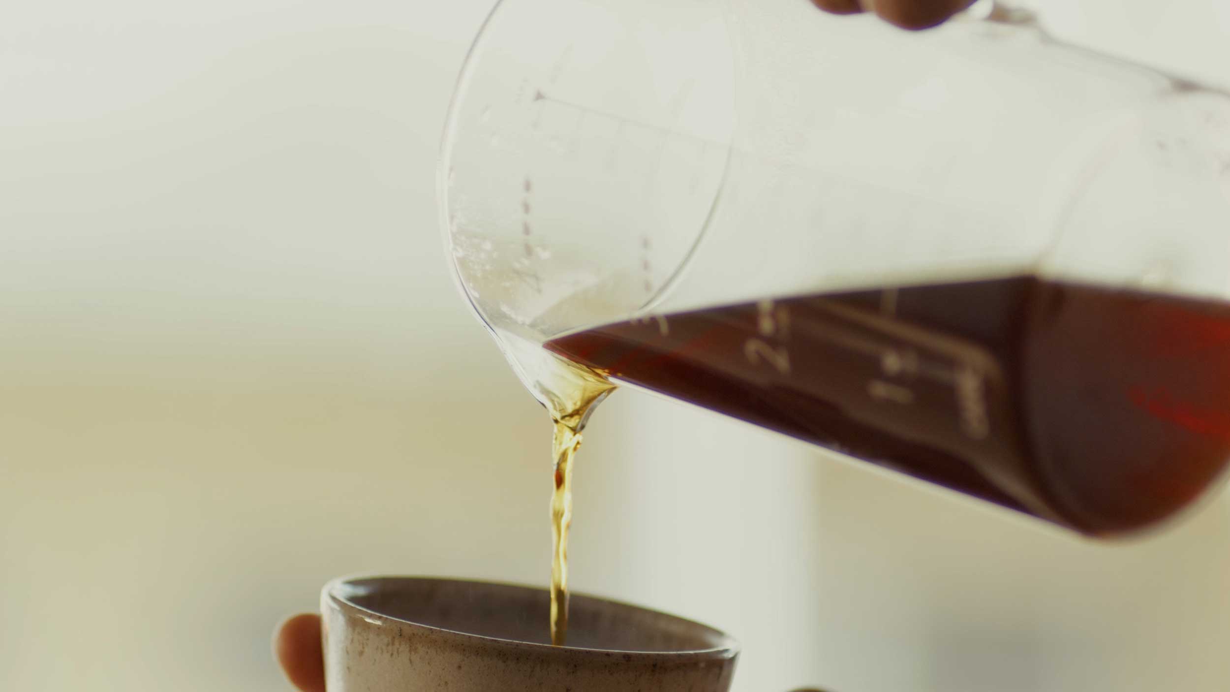 Streetside billboard with flyposters of the Batch.Works brand and illustrations