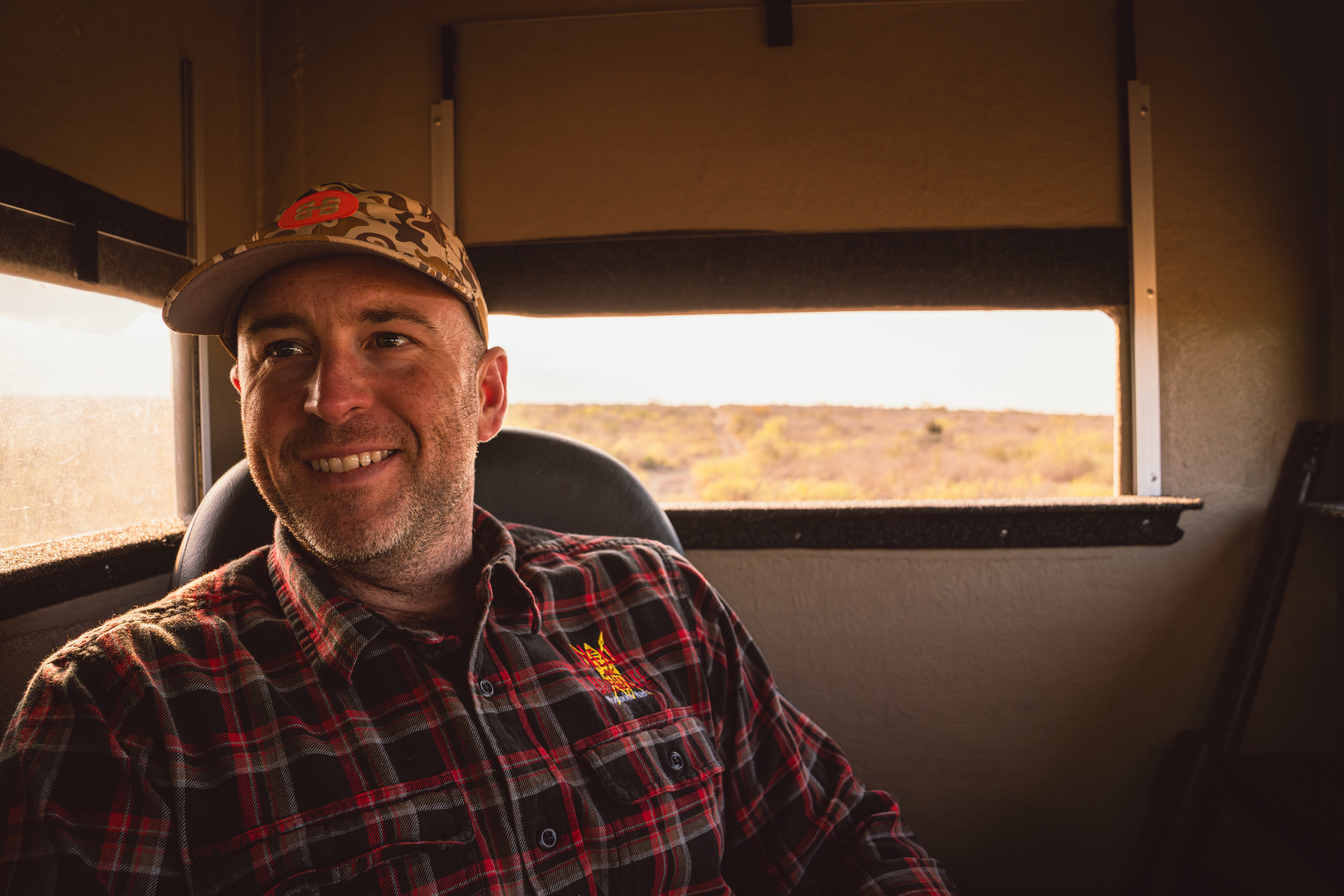 hunter smiling in a south texas deer stand