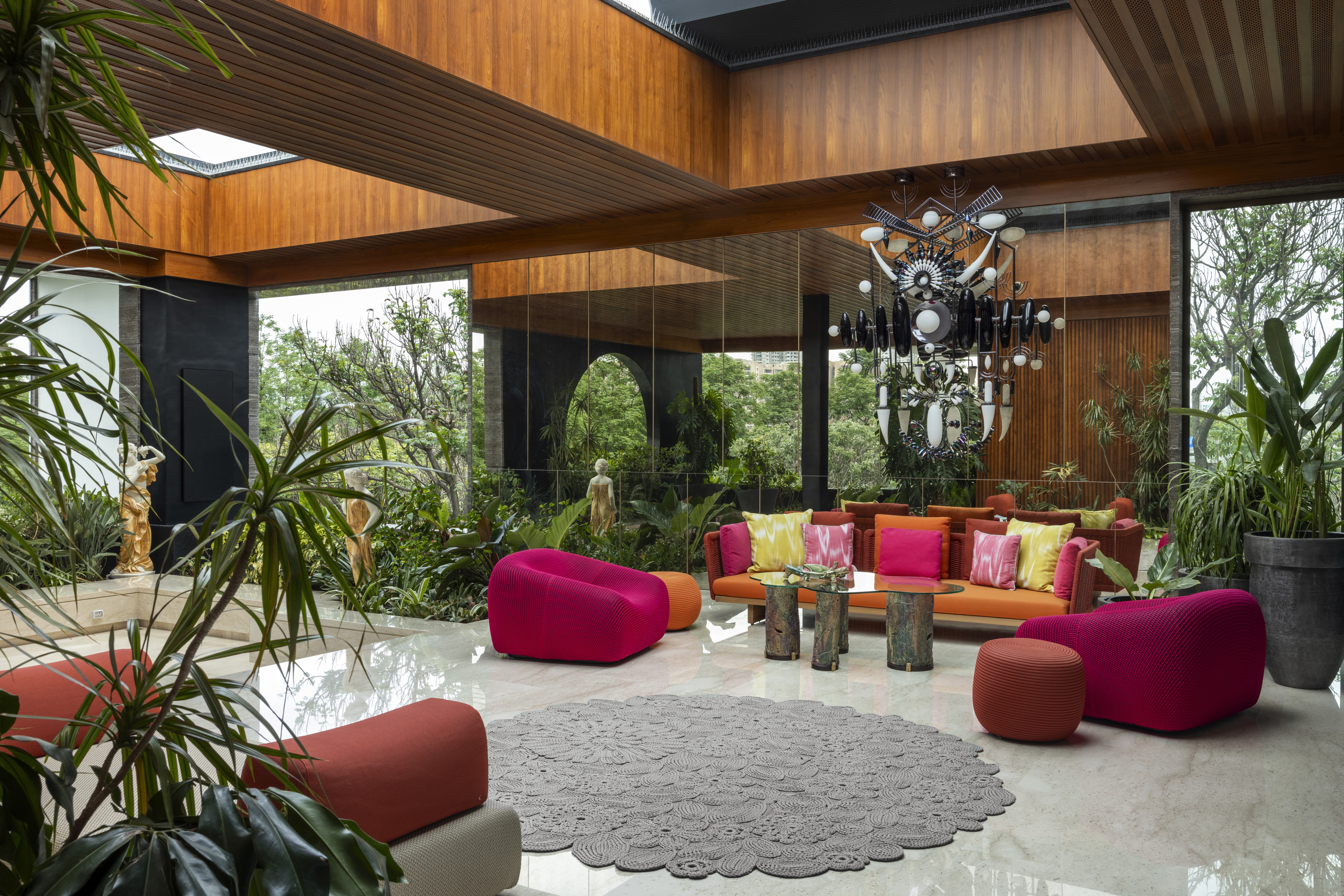 Warm orange living room with sofa and lamp.