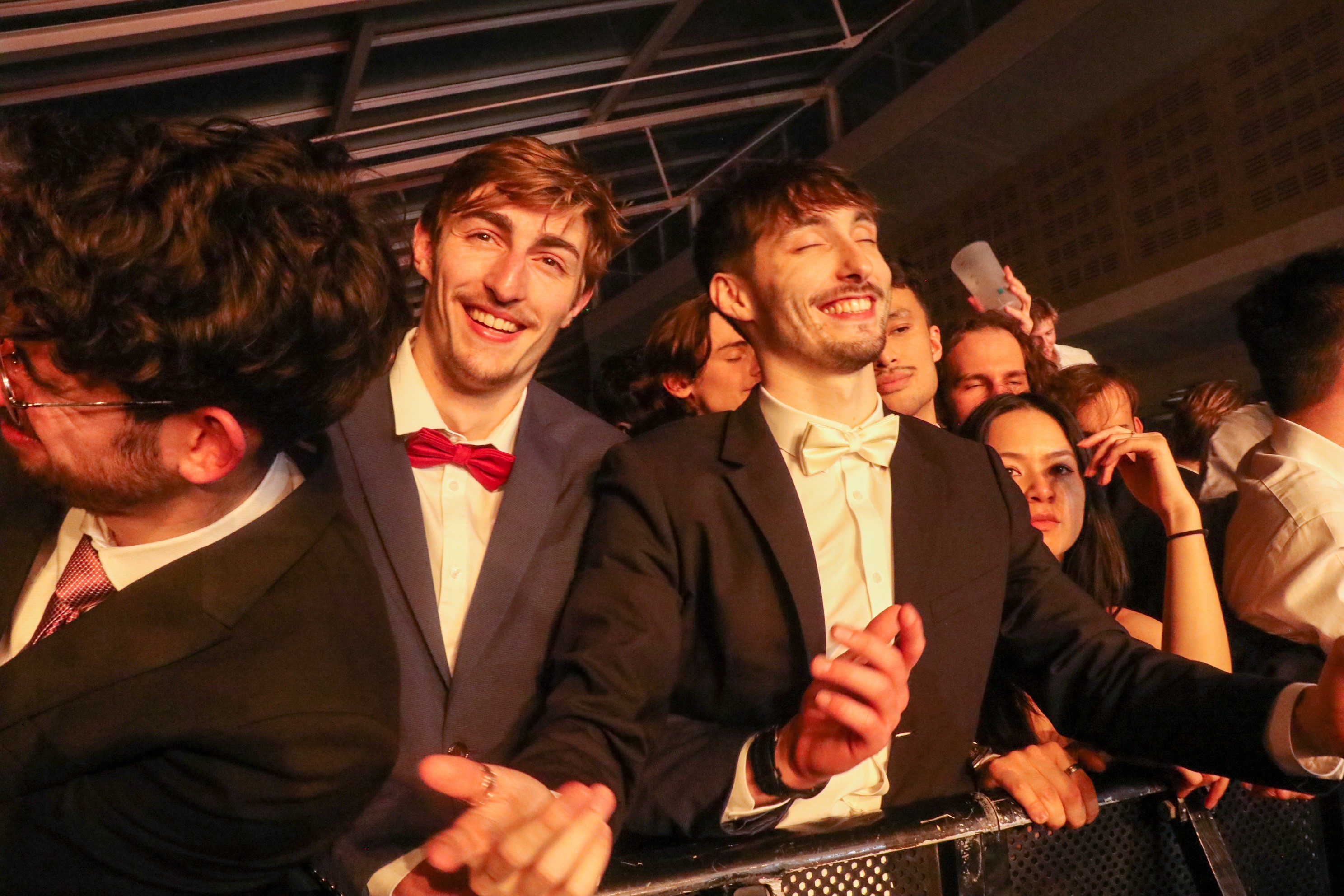 Man sitting posing on a barstool.