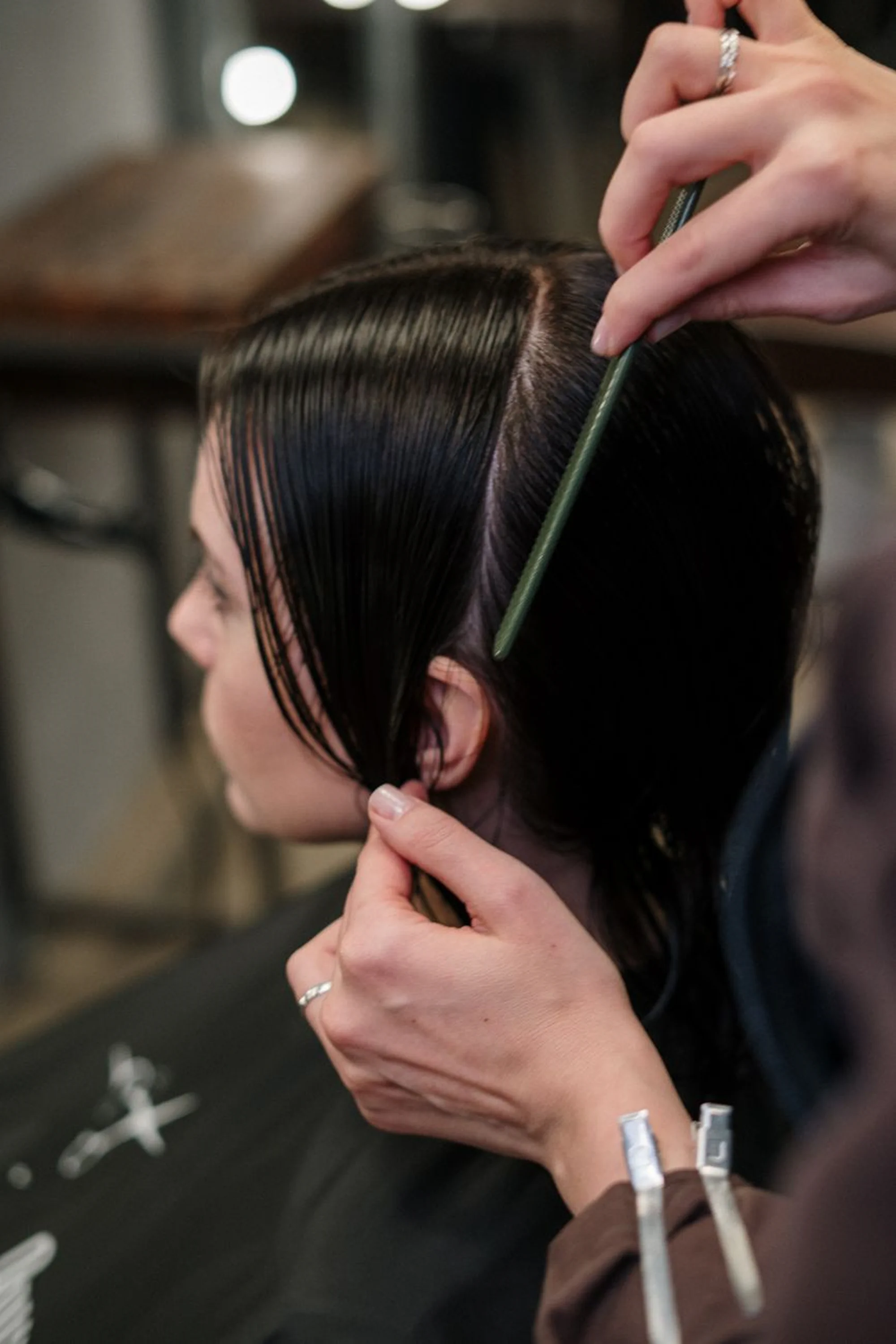 Woman with a polished haircut and everyday styling at Elysia Hair & Nail Salon