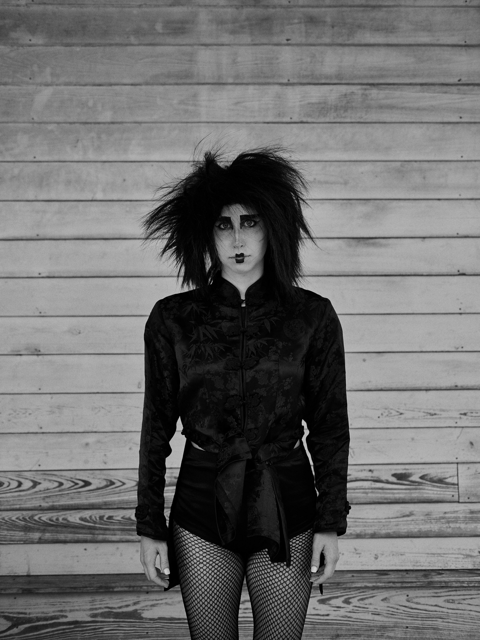 Black and white portraits of young alternative, romantic, goth, freak, punk and metal character against a textured New Orleans backdrop. 