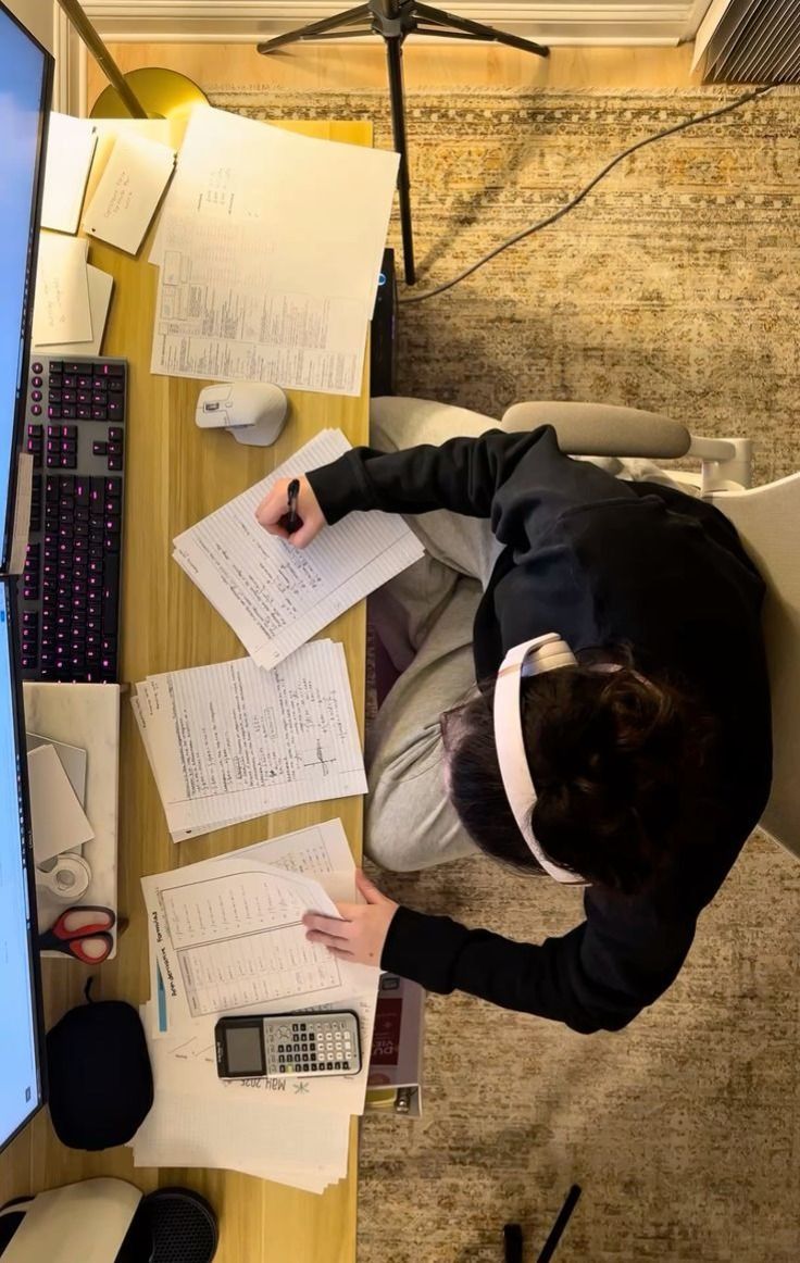 A calculator ontop a table