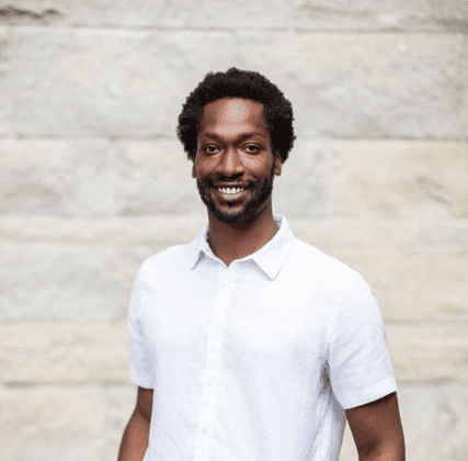 a man smiling for the camera