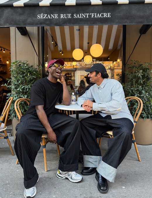 Two friends at a Paris cafe
