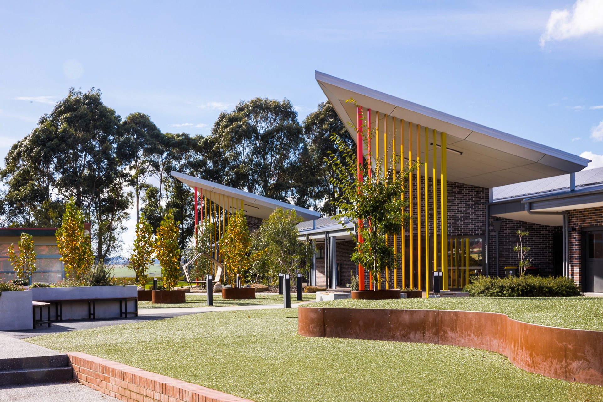 Geometric wooden wall panels with angled shapes and warm highlights.