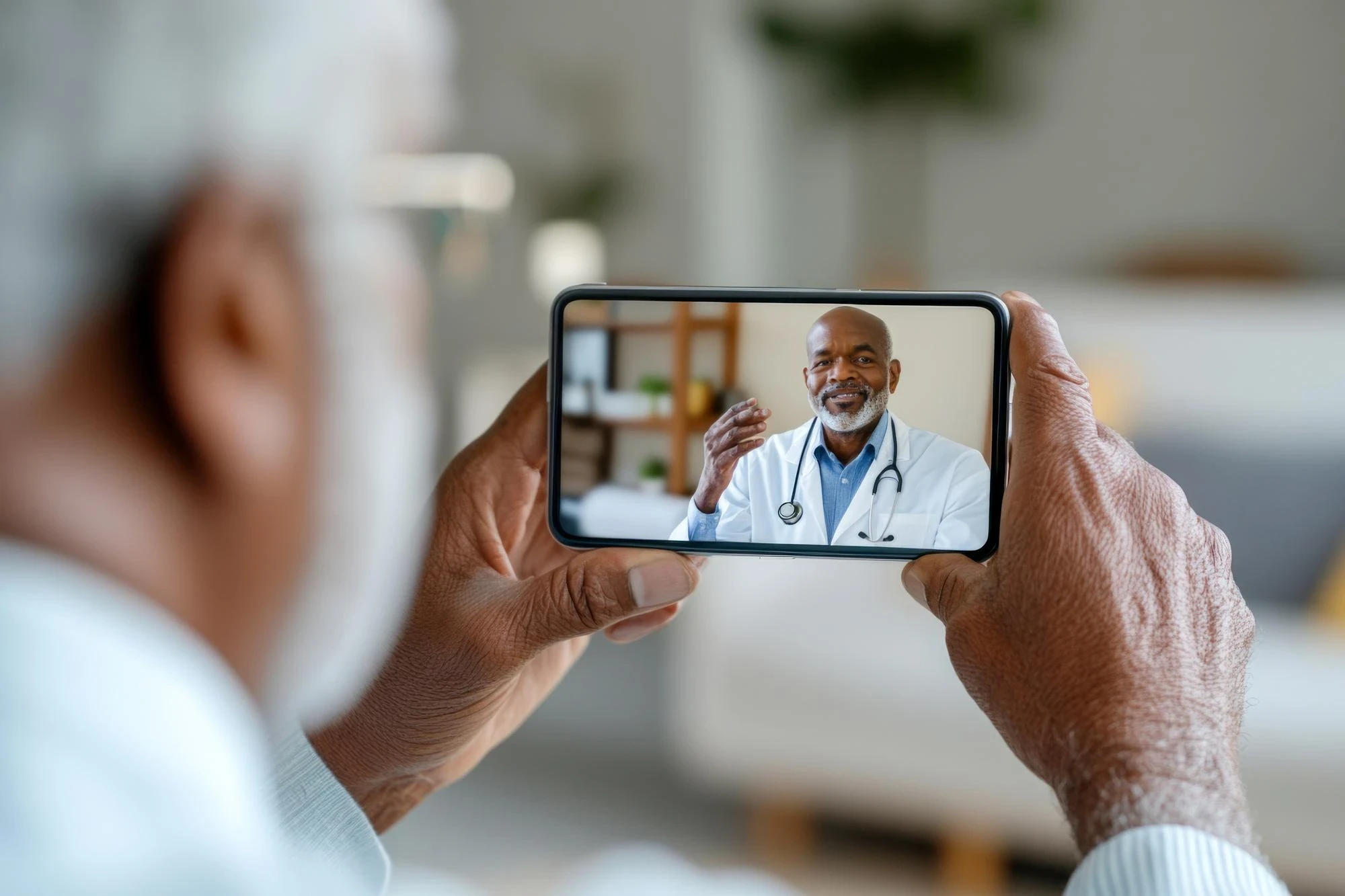 Senior patient in video call with doctor