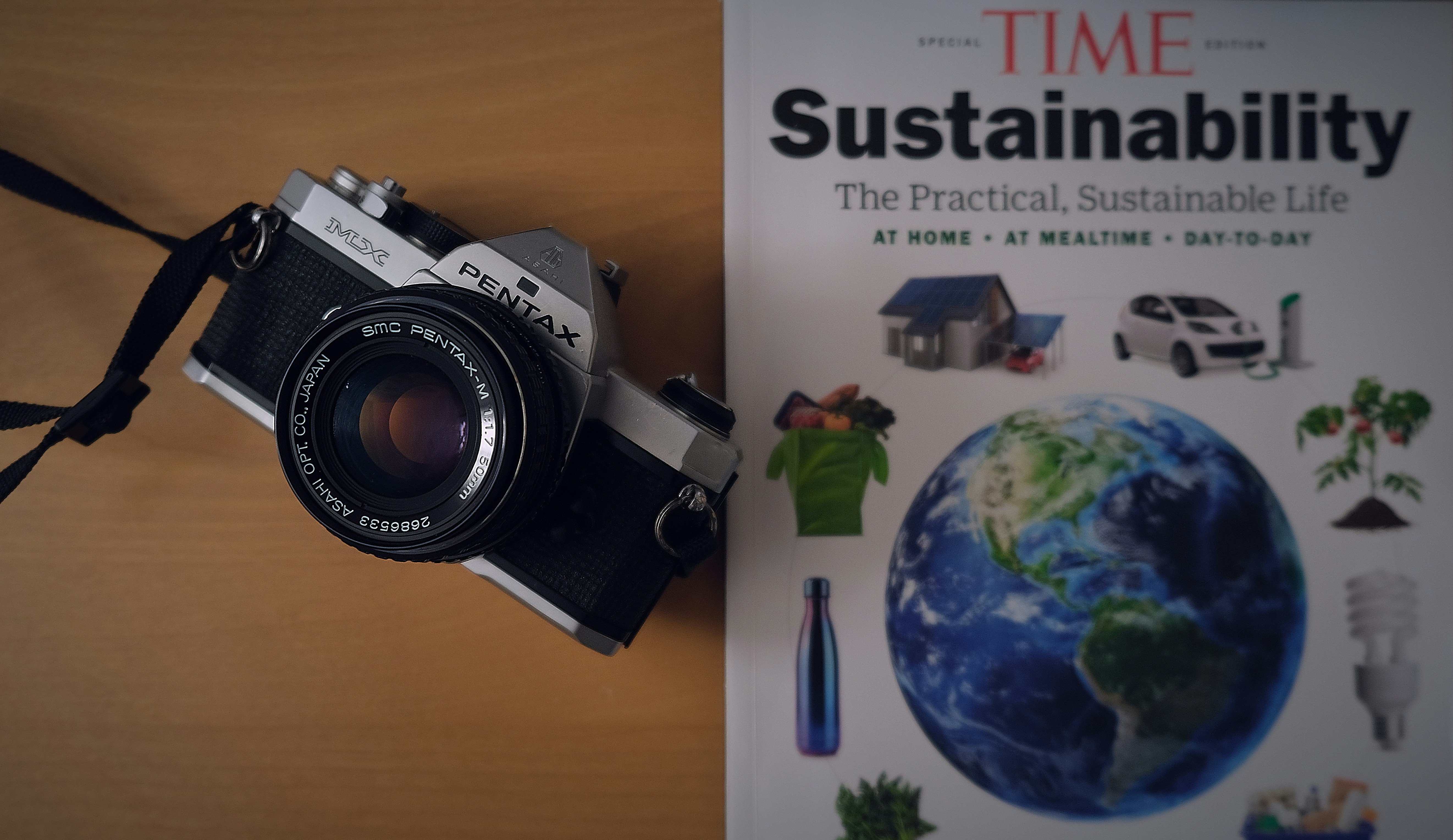 black and silver canon dslr camera