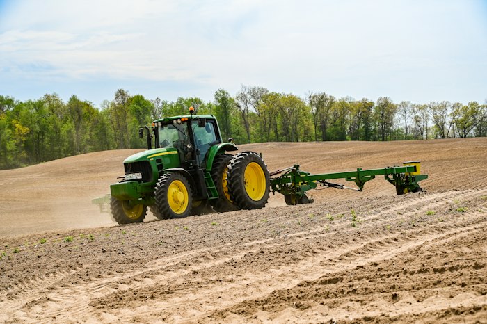 AgriWorks seeder working a field with section control active