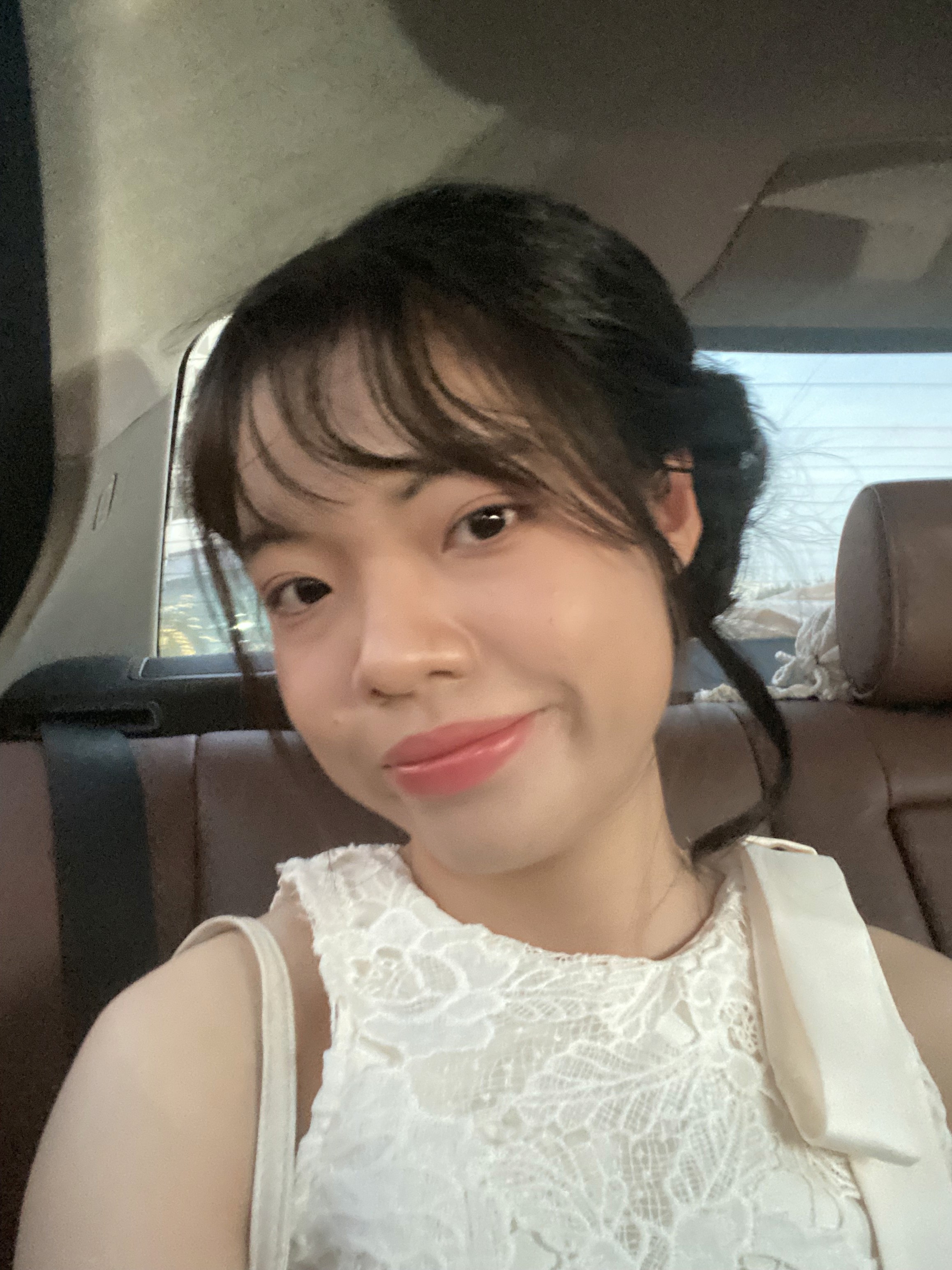 A young girl smiling